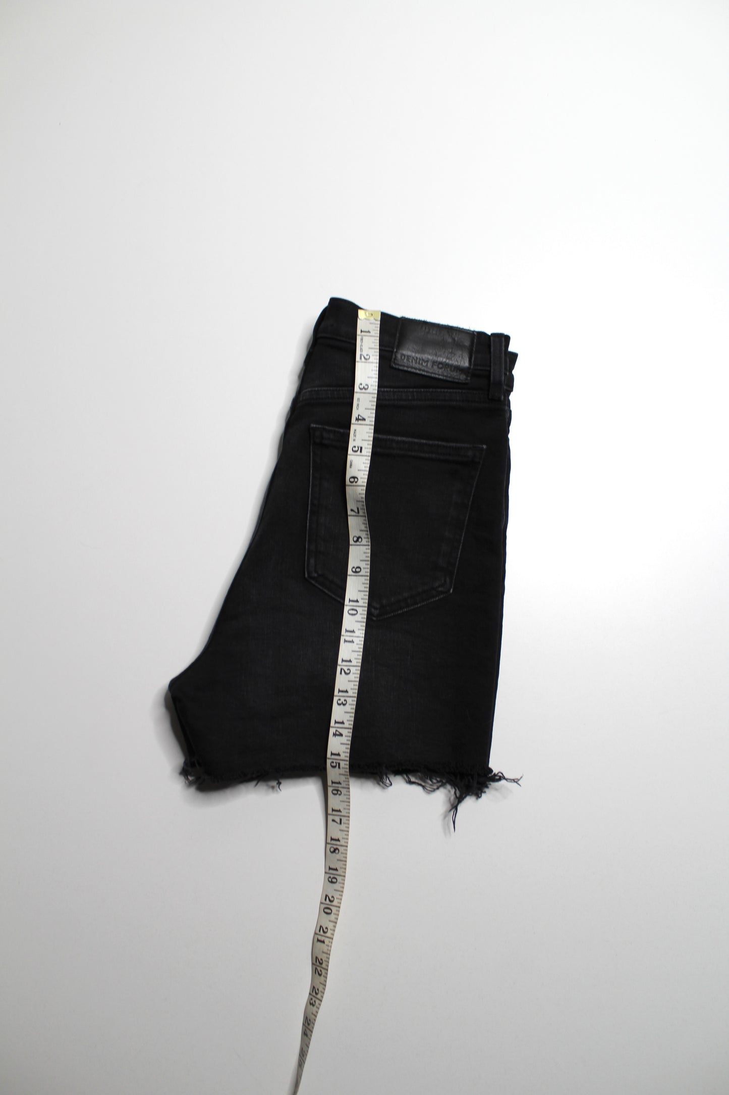 Aritzia Denim Forum black ’arlo’ cut off shorts, size 28