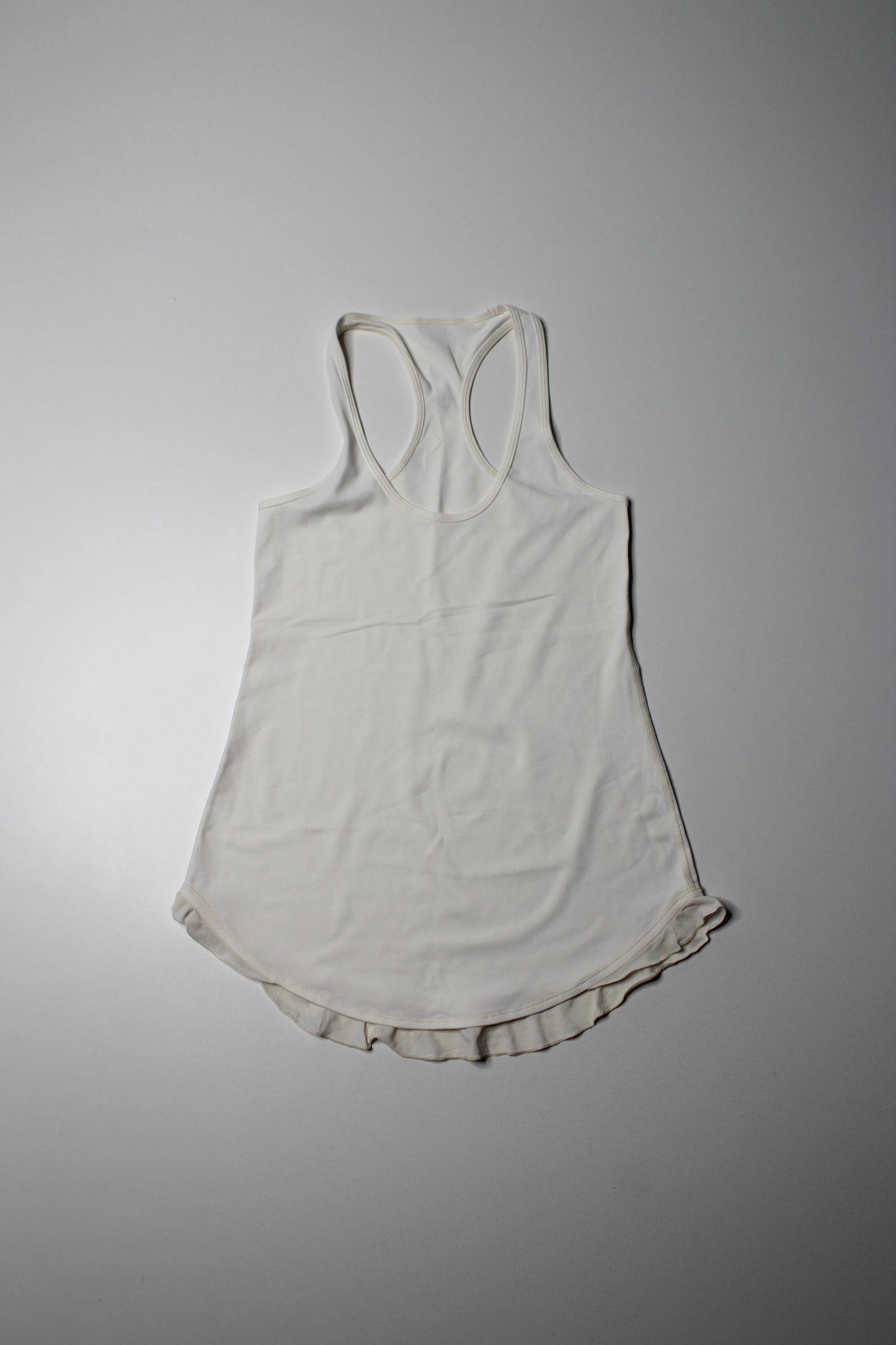 Lululemon cream ‘cool racer back’ tank, size 6 *frilly hem (sale: was $20)
