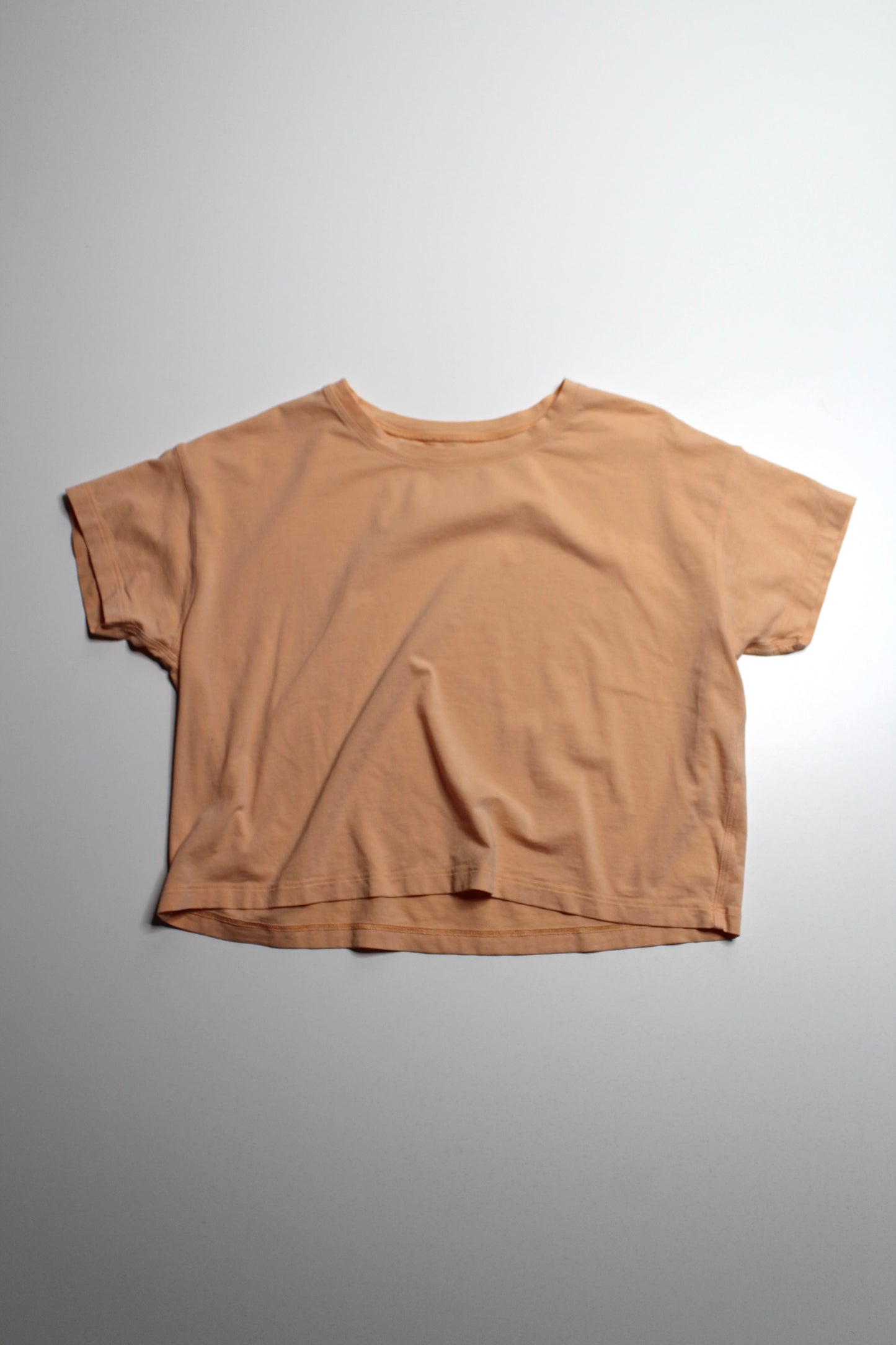 Lululemon cates t shirt, no size. Fits like 4 (relaxed fit)