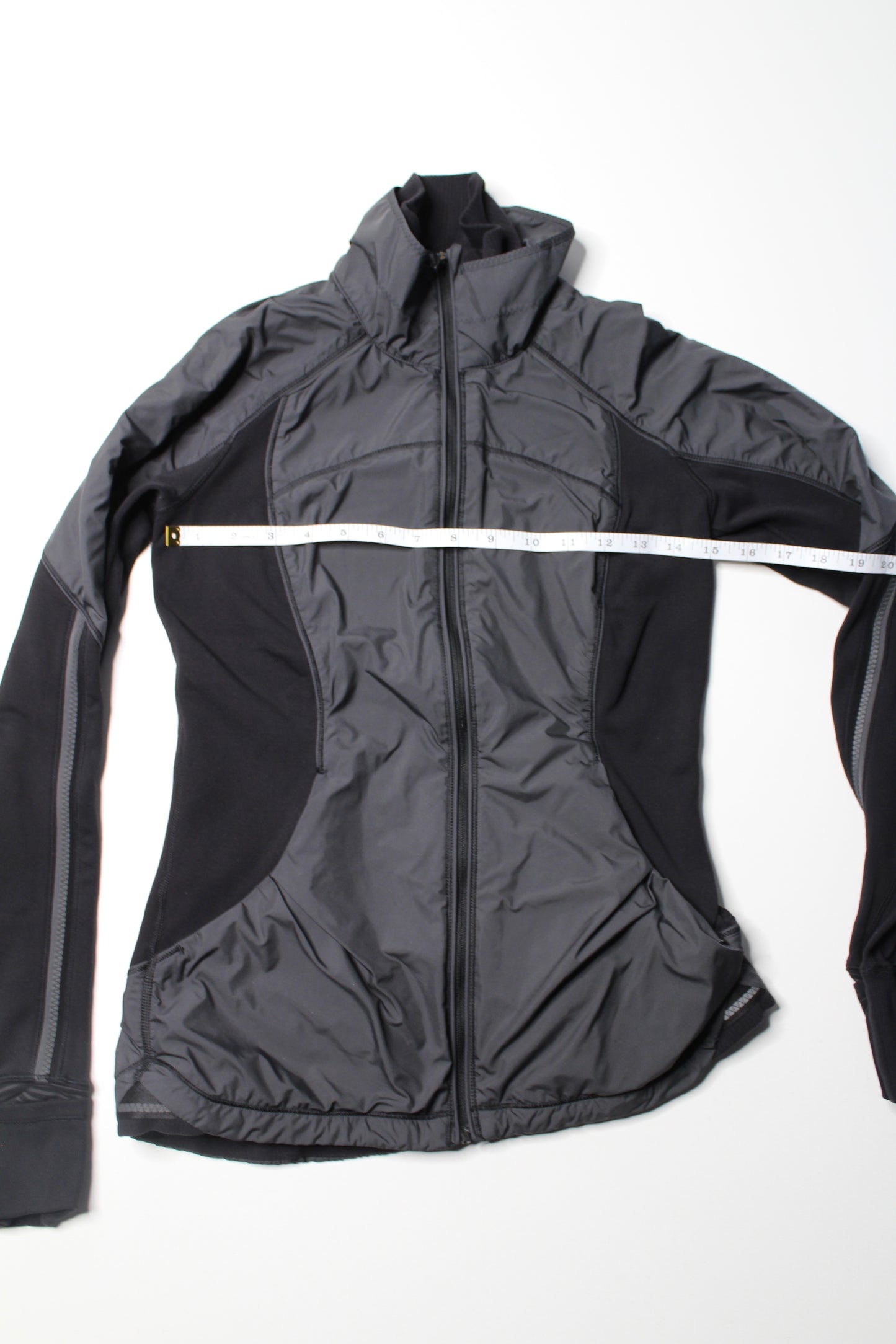 Lululemon black ‘can’t stop’ run jacket, size 4