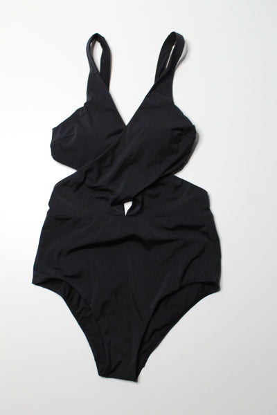 Lululemon black ‘all that glimmers wrap one piece swimsuit, no size. Fits like 8 (medium)