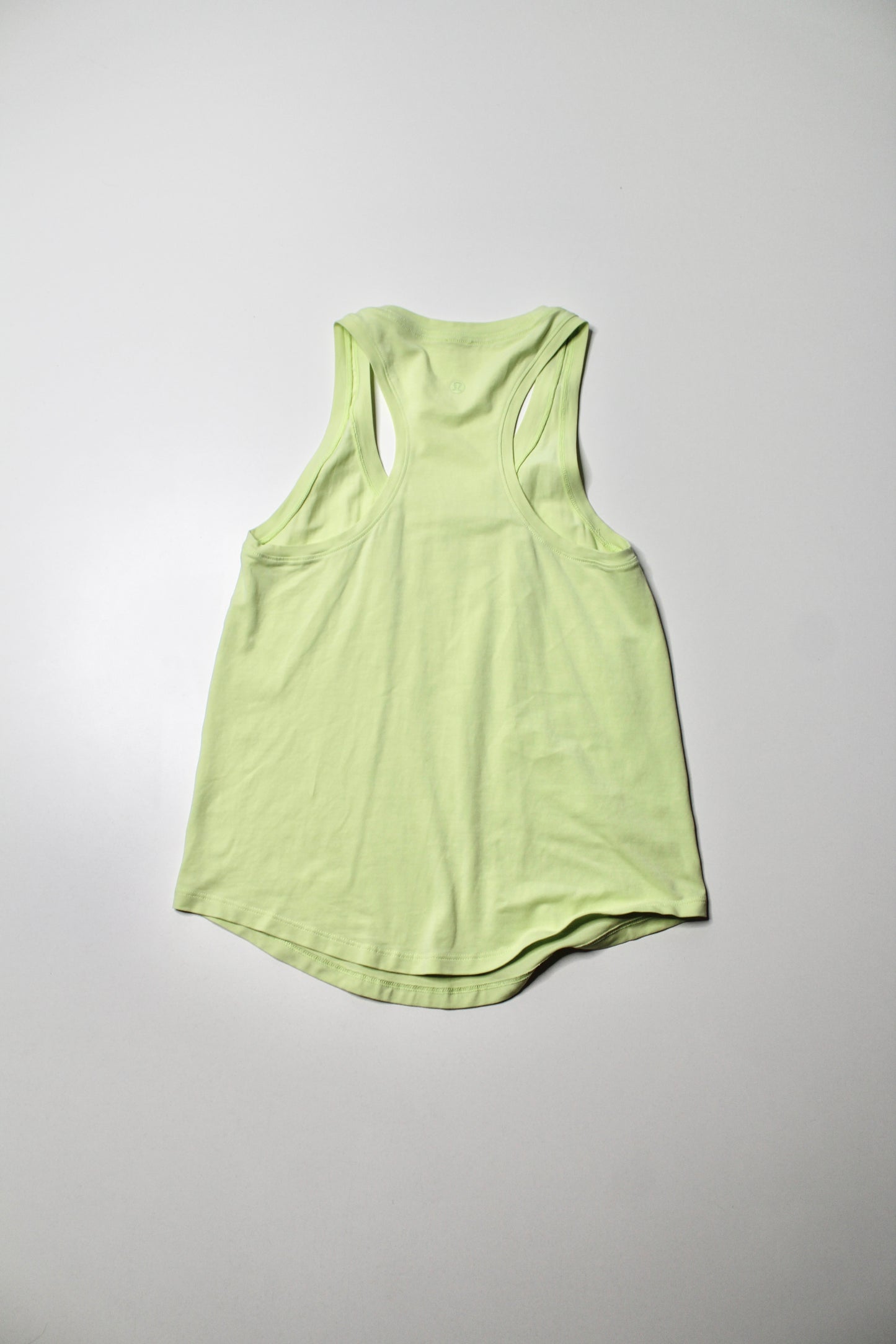 Lululemon light yellow ‘love’ tank, no size. Fits 4/6