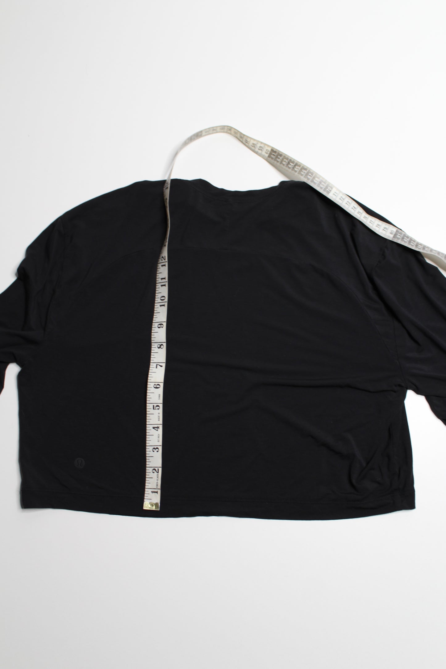 Lululemon black modal cropped t shirt, no size. Fits 6/8