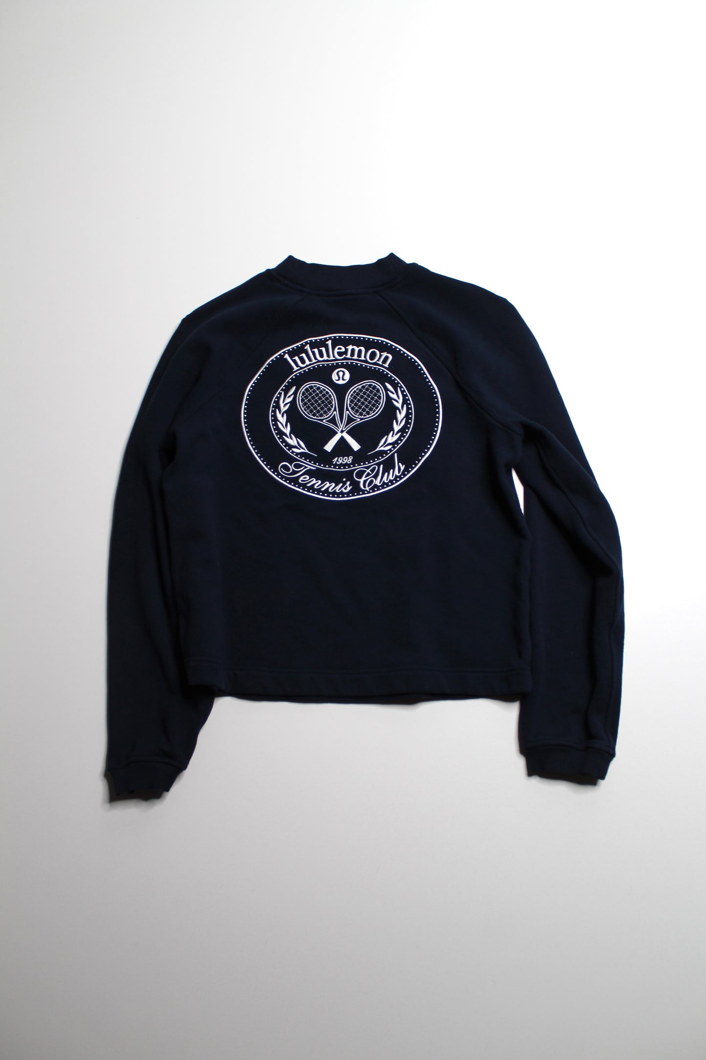 Lululemon navy ‘tennis club’ sweatshirt, no size. Fits like 6 (or size small)