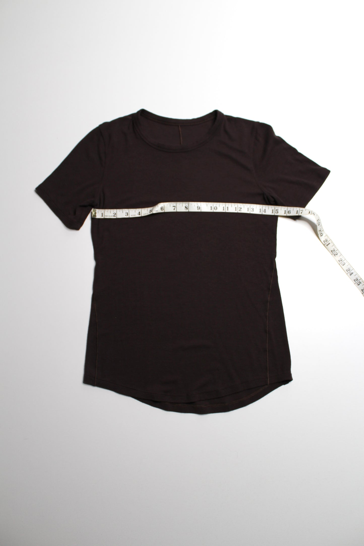 Lululemon dark brown ribbed ‘hold tight’ short sleeve, no size. Fits like 6