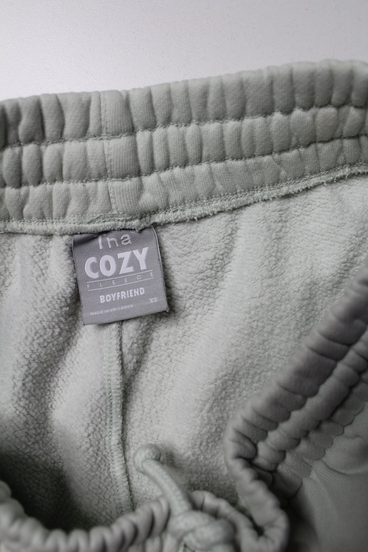 Aritzia TNA ultra light green ‘cozy fleece boyfriend’ shorts, size xs