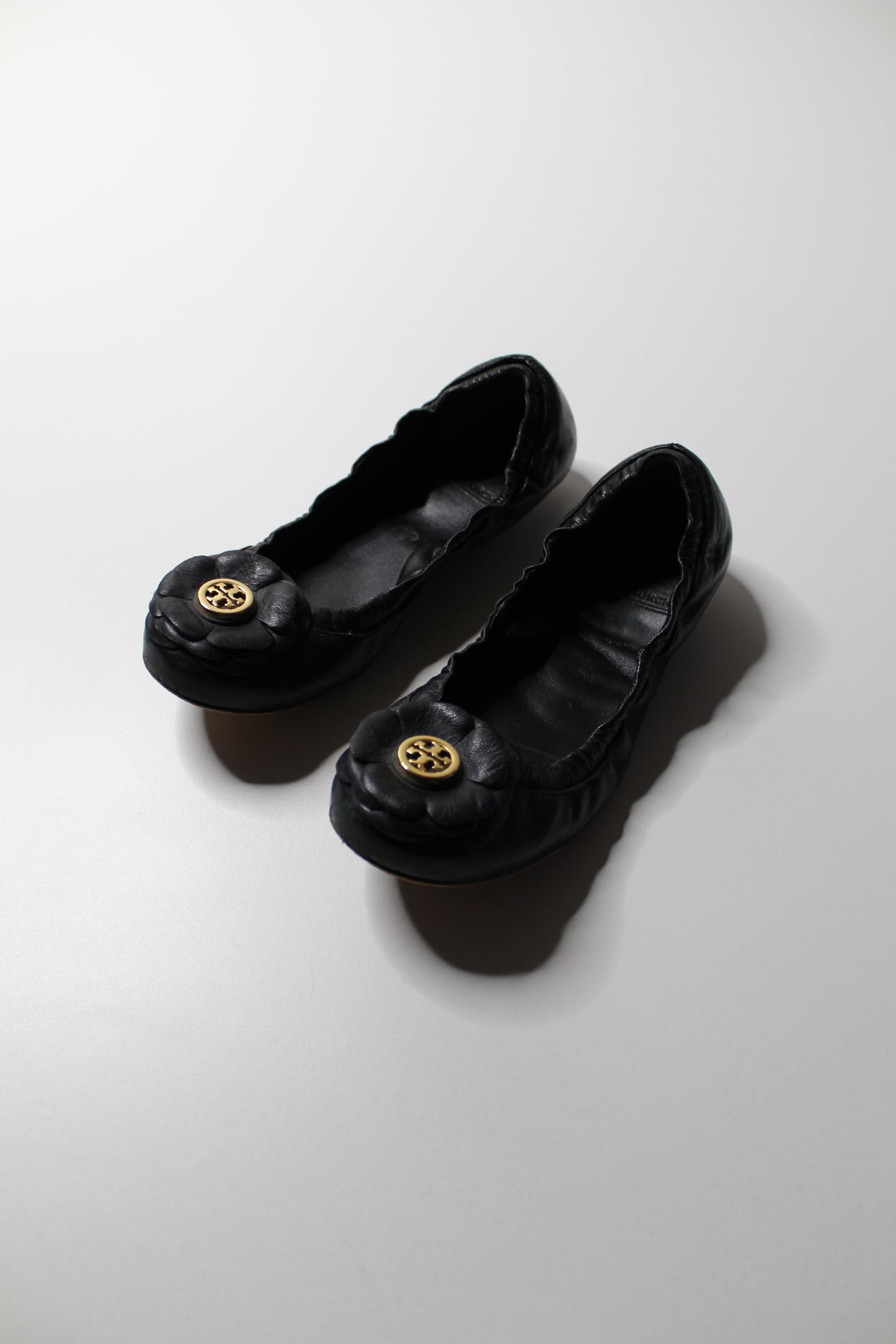 Tory Burch black ‘rose’ ballet flats, size 6.5