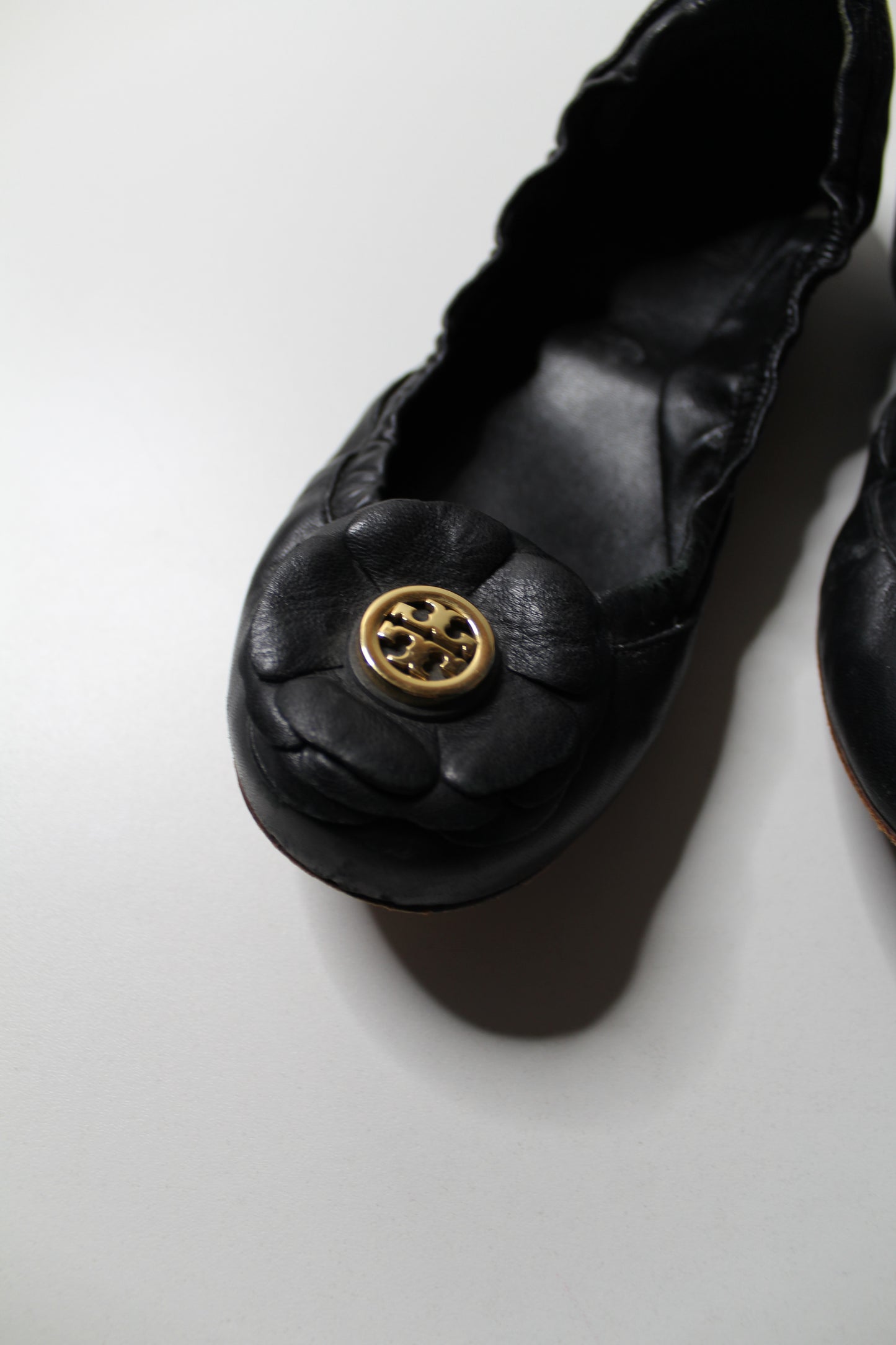 Tory Burch black ‘rose’ ballet flats, size 6.5