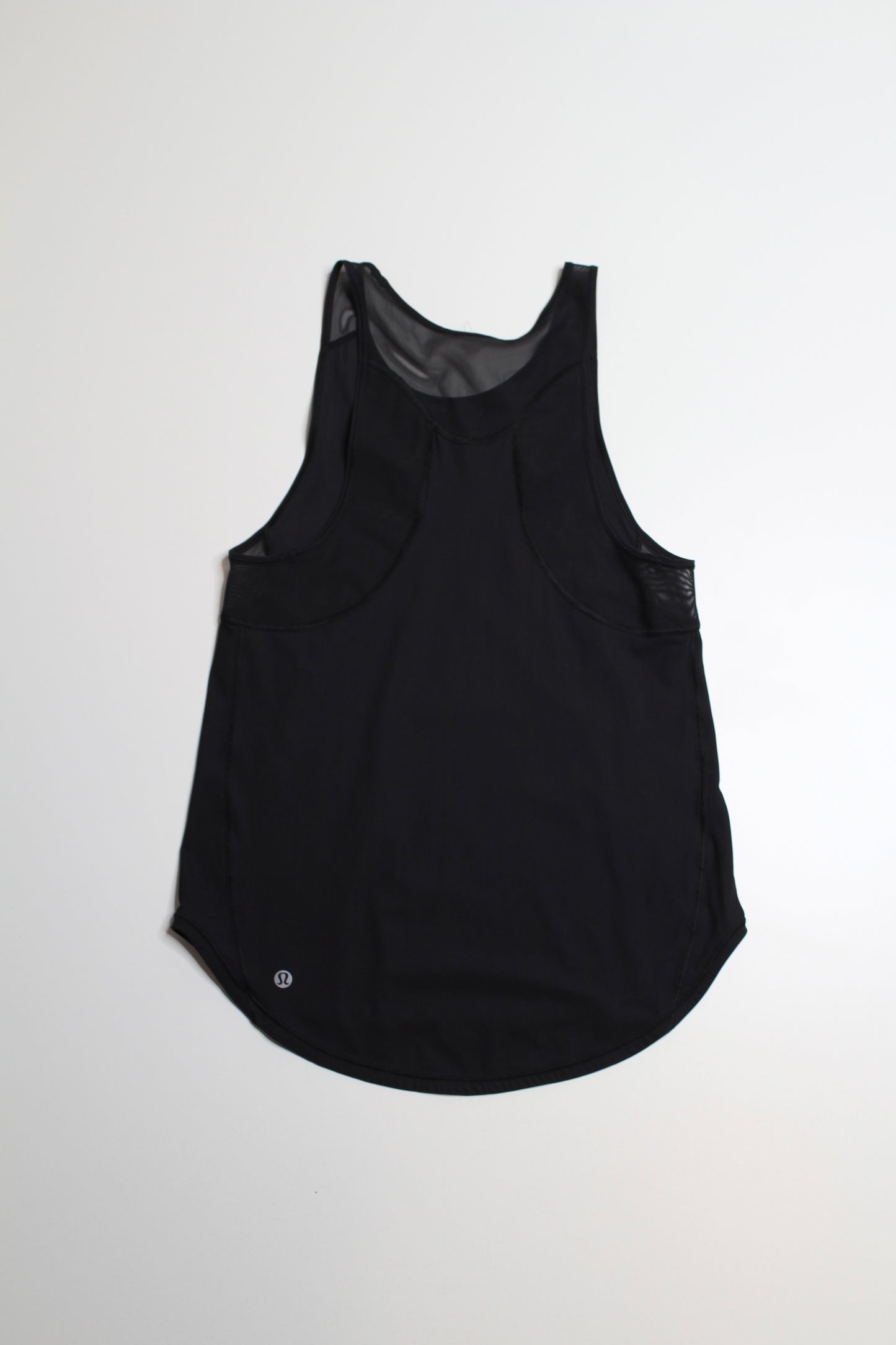 Lululemon black back sculpt tank, no size. Fits like size 2 (loose fit) Fits 2/4