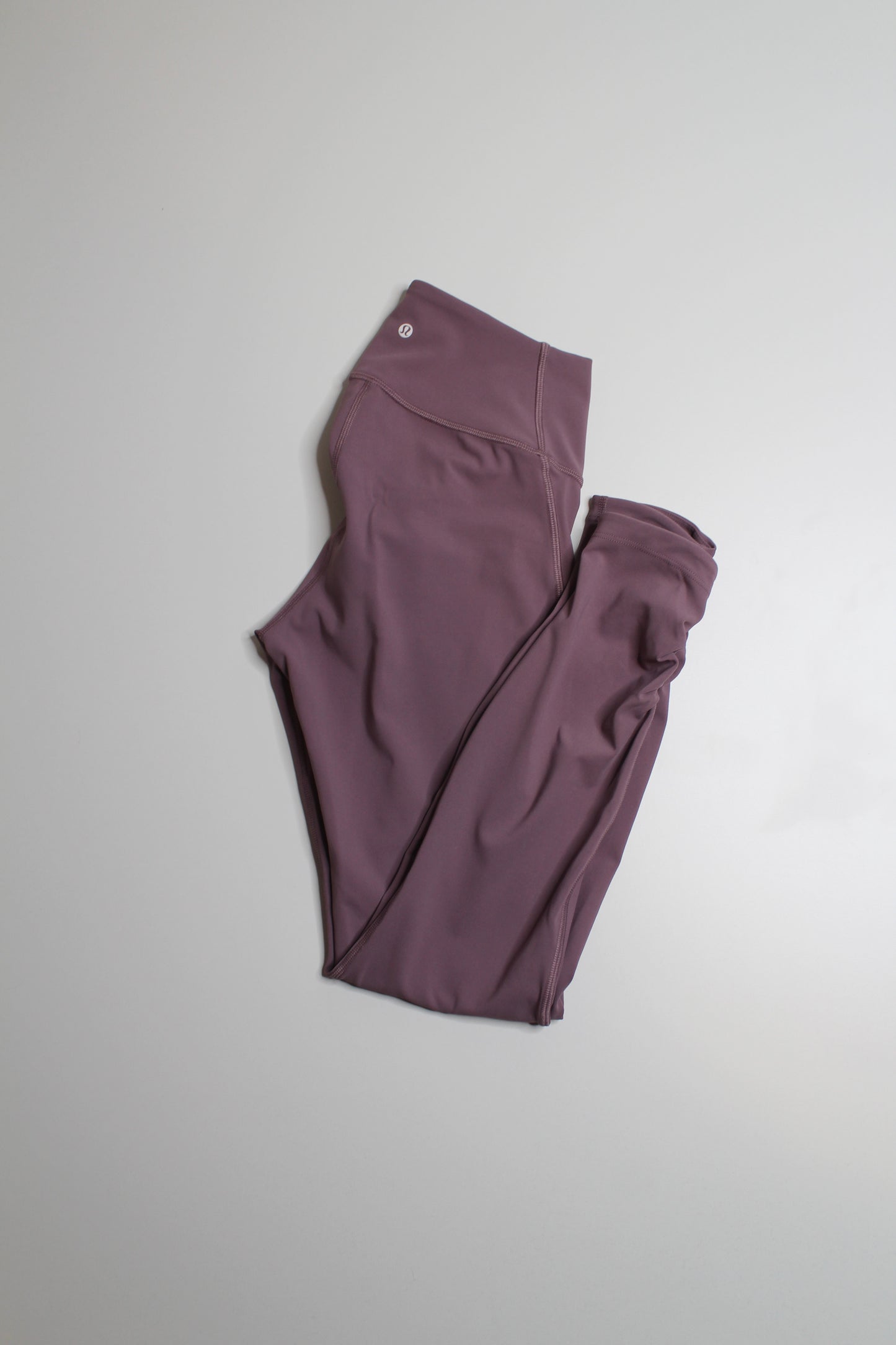 Lululemon dusty mauve high-rise awakening tight, size 4 (25”) *taryn toomey collection (price reduced: was $58)