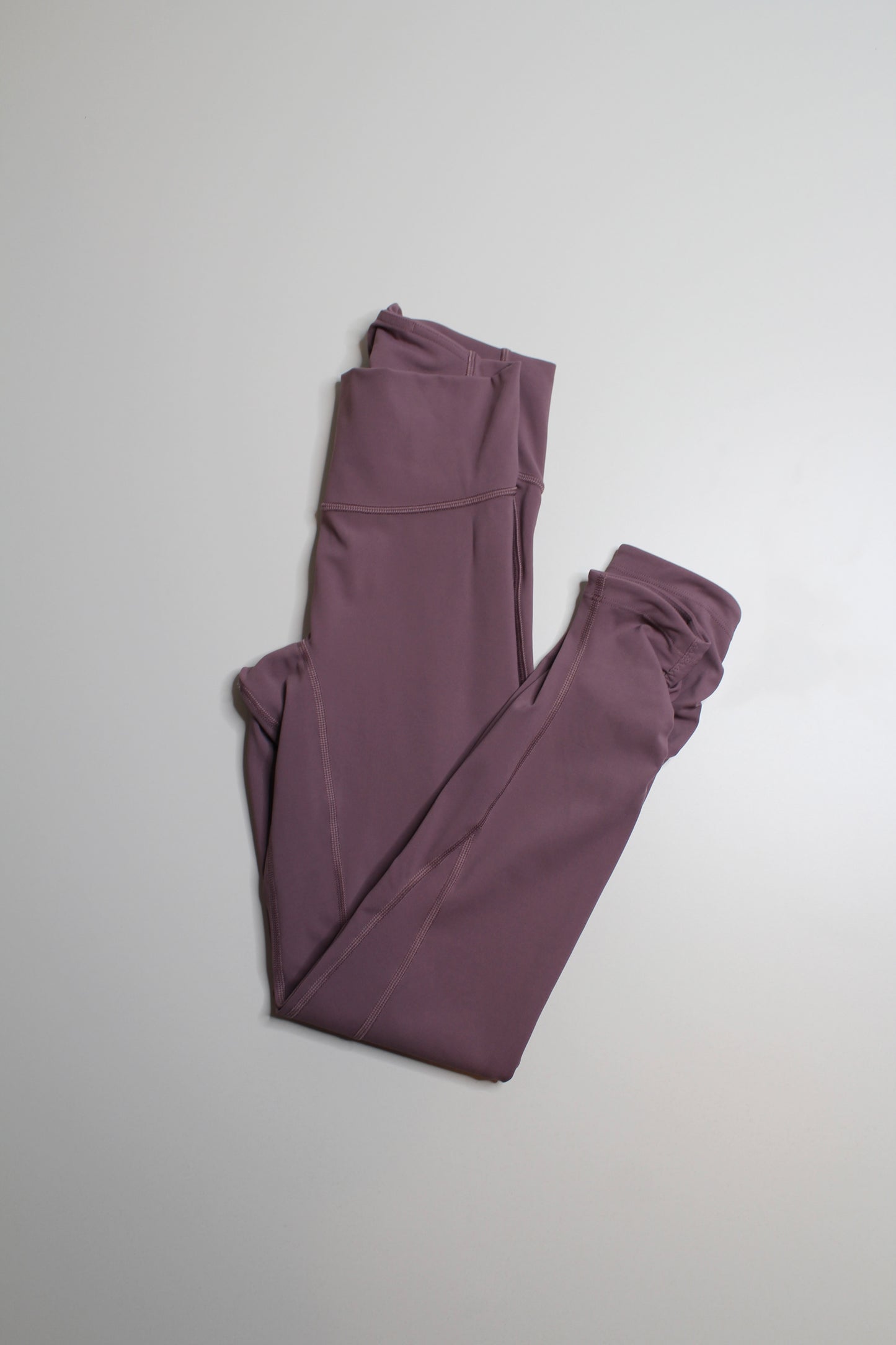 Lululemon dusty mauve high-rise awakening tight, size 4 (25”) *taryn toomey collection (price reduced: was $58)