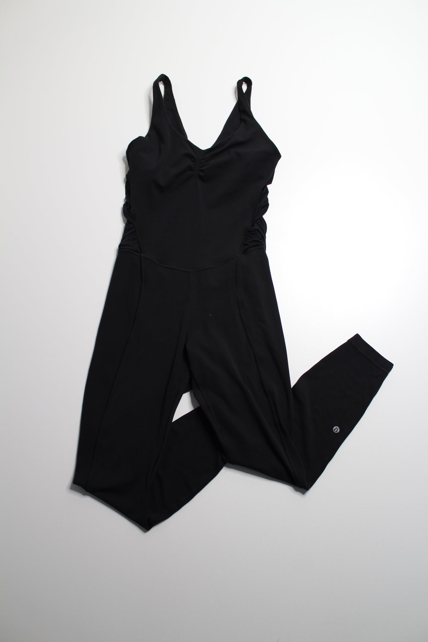 Lululemon black ruched yoga bodysuit, size 8 (25”)