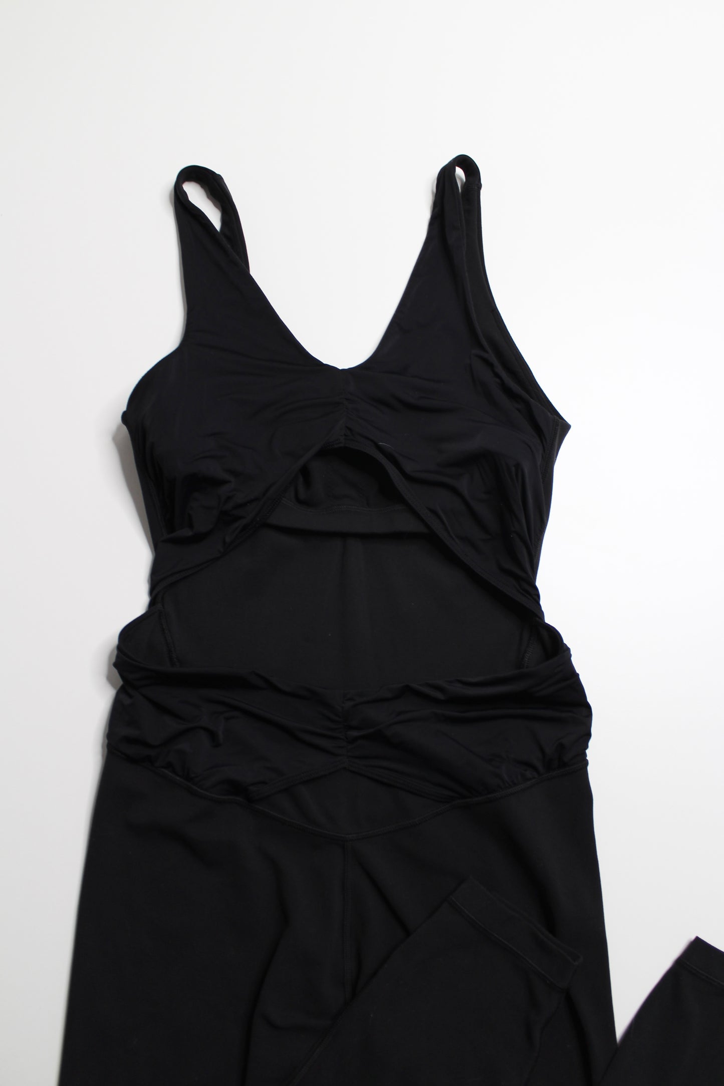 Lululemon black ruched yoga bodysuit, size 8 (25”)