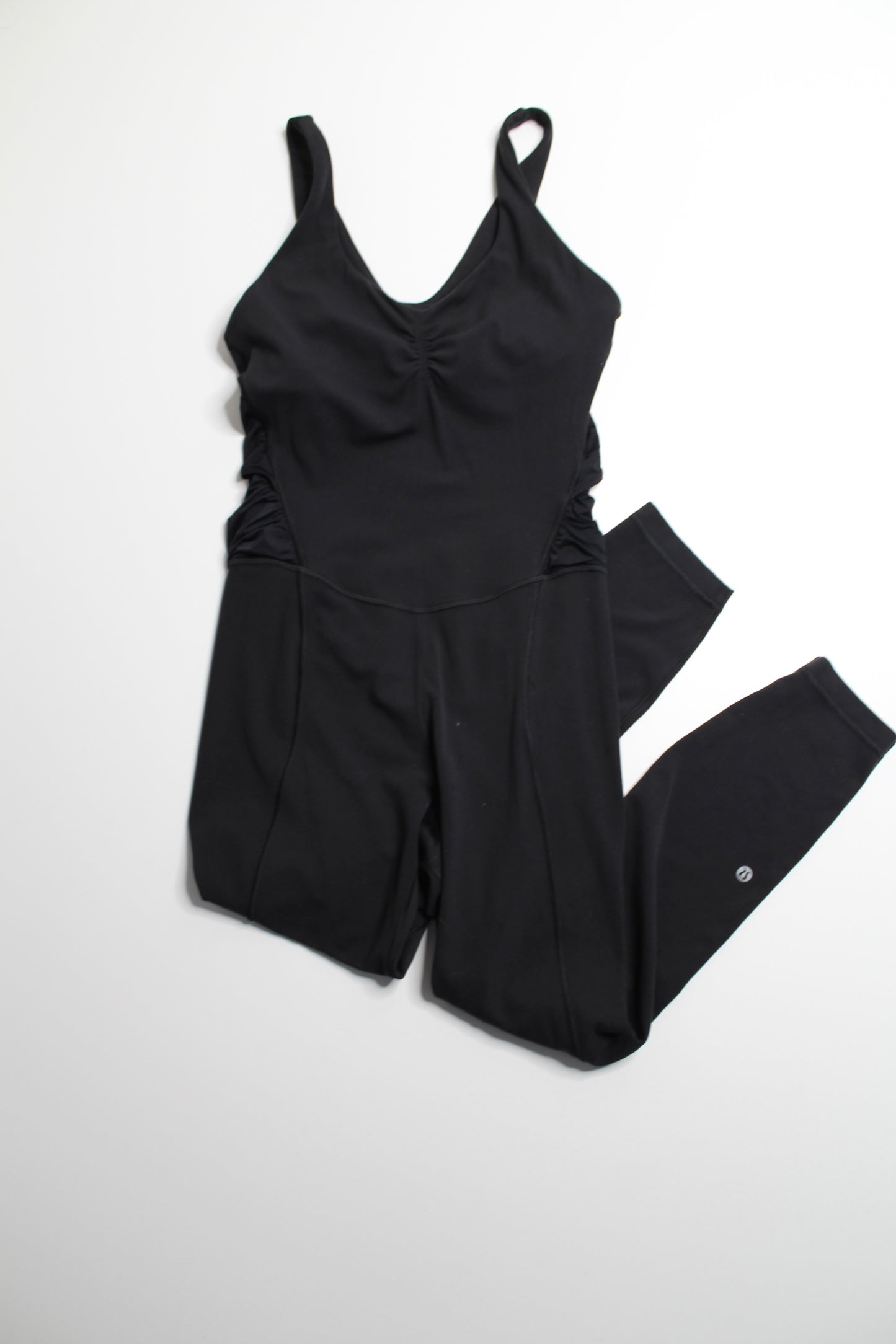 Lululemon black ruched yoga bodysuit, size 8 (25”)