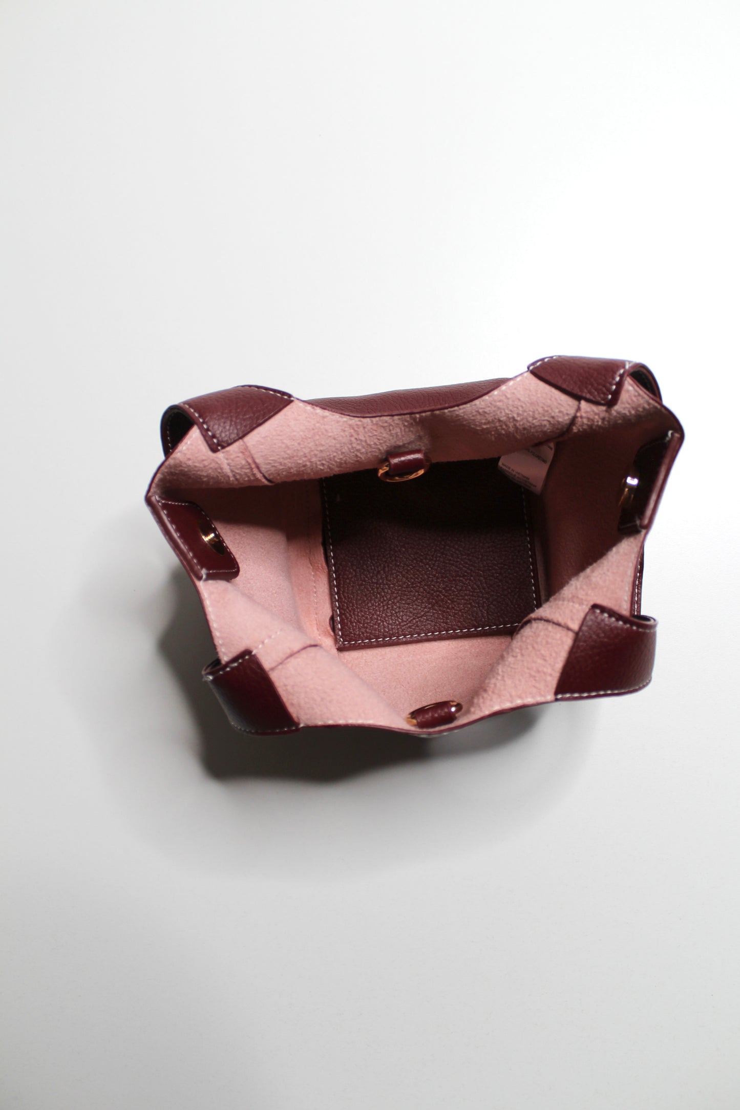 Anthropologie burgundy Sonia slouchy faux leather mini tote purse with matching zippered pouch