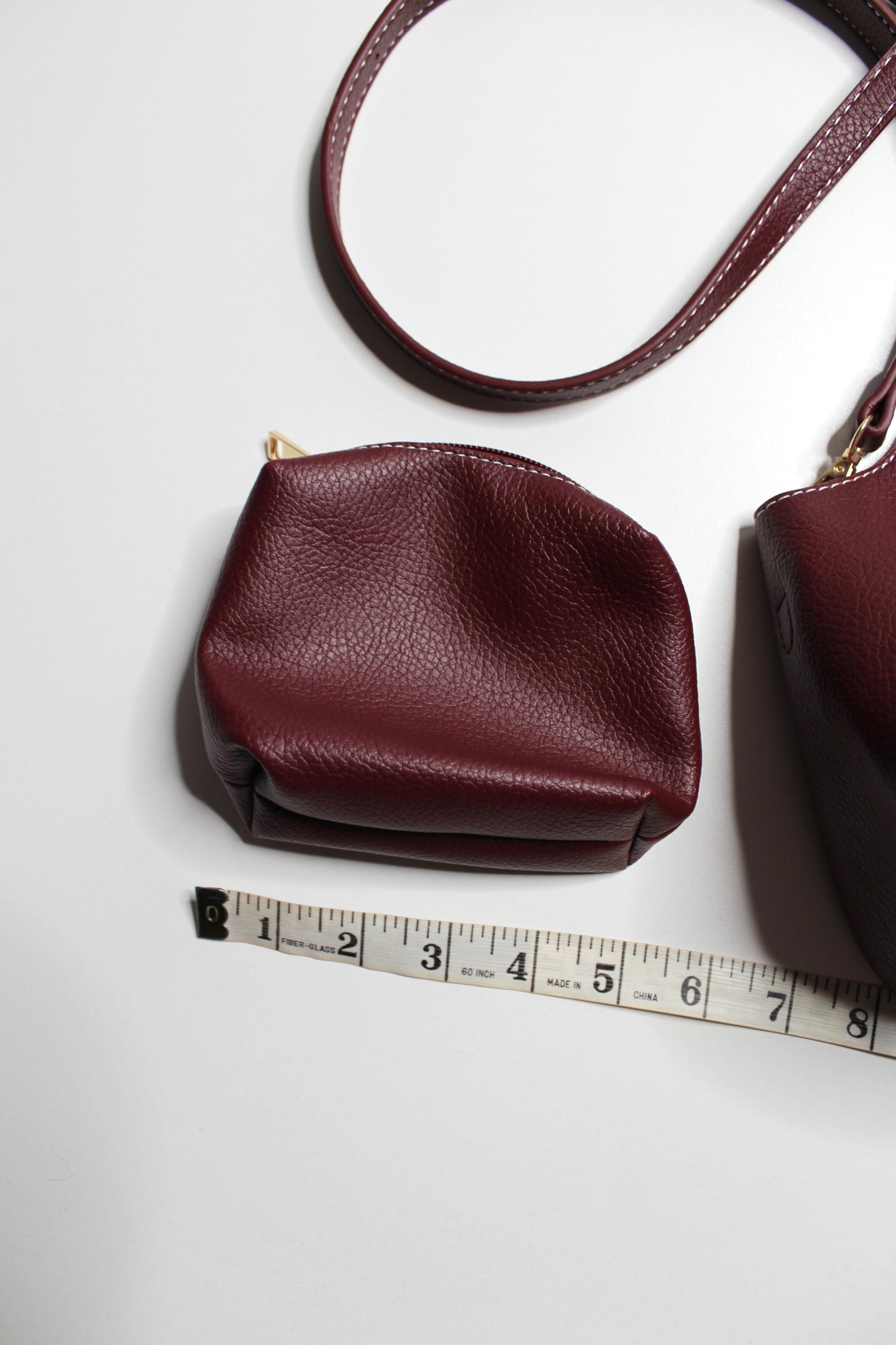 Anthropologie burgundy Sonia slouchy faux leather mini tote purse with matching zippered pouch
