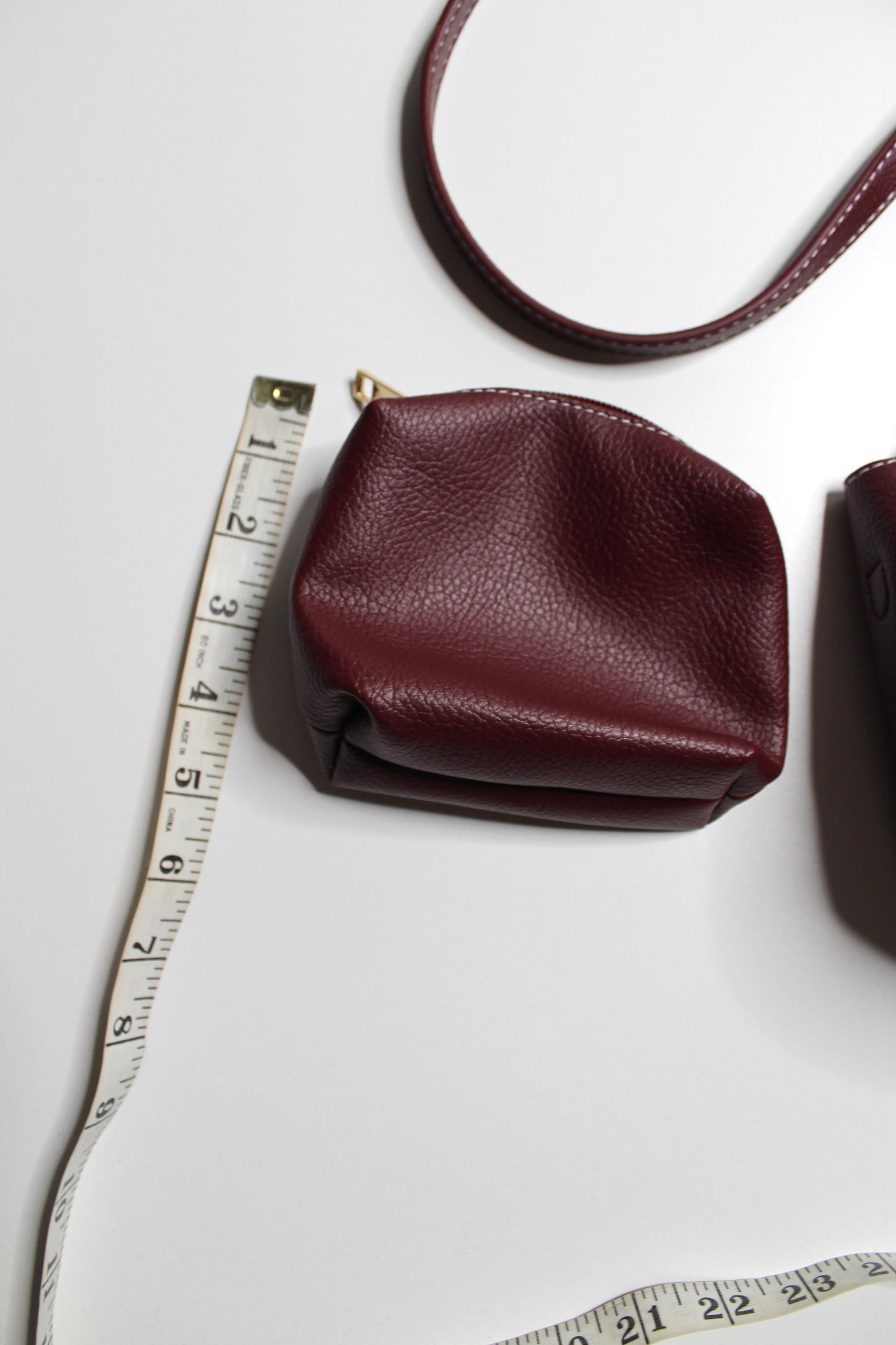 Anthropologie burgundy Sonia slouchy faux leather mini tote purse with matching zippered pouch