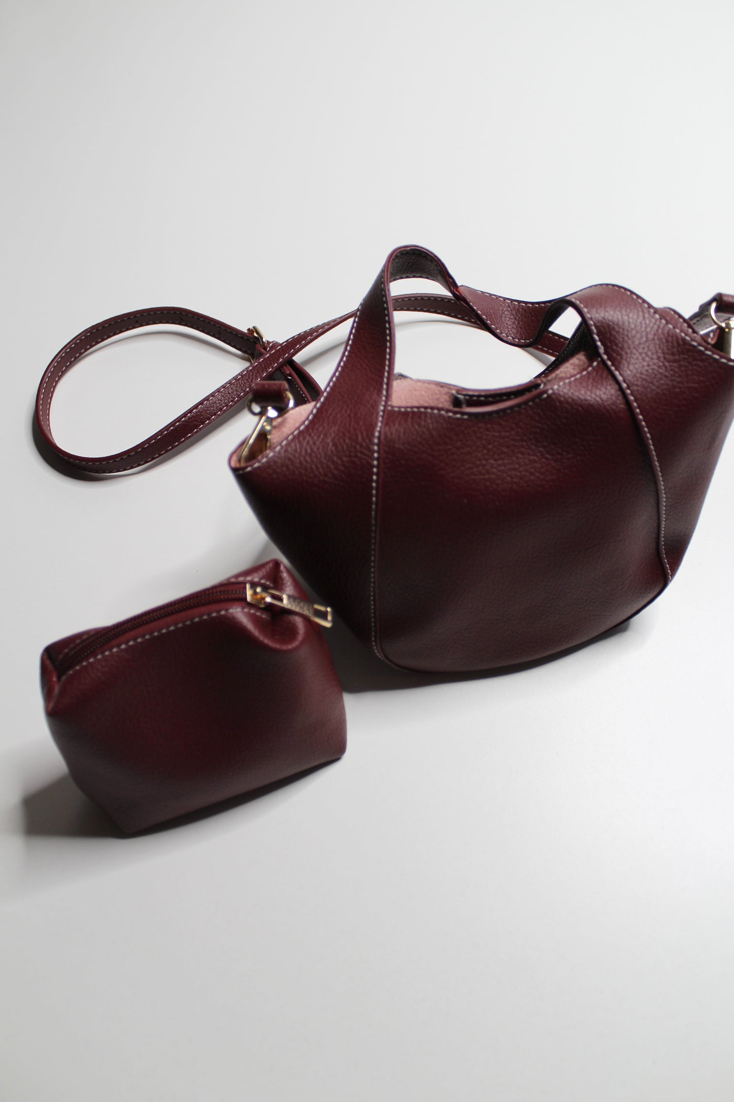 Anthropologie burgundy Sonia slouchy faux leather mini tote purse with matching zippered pouch