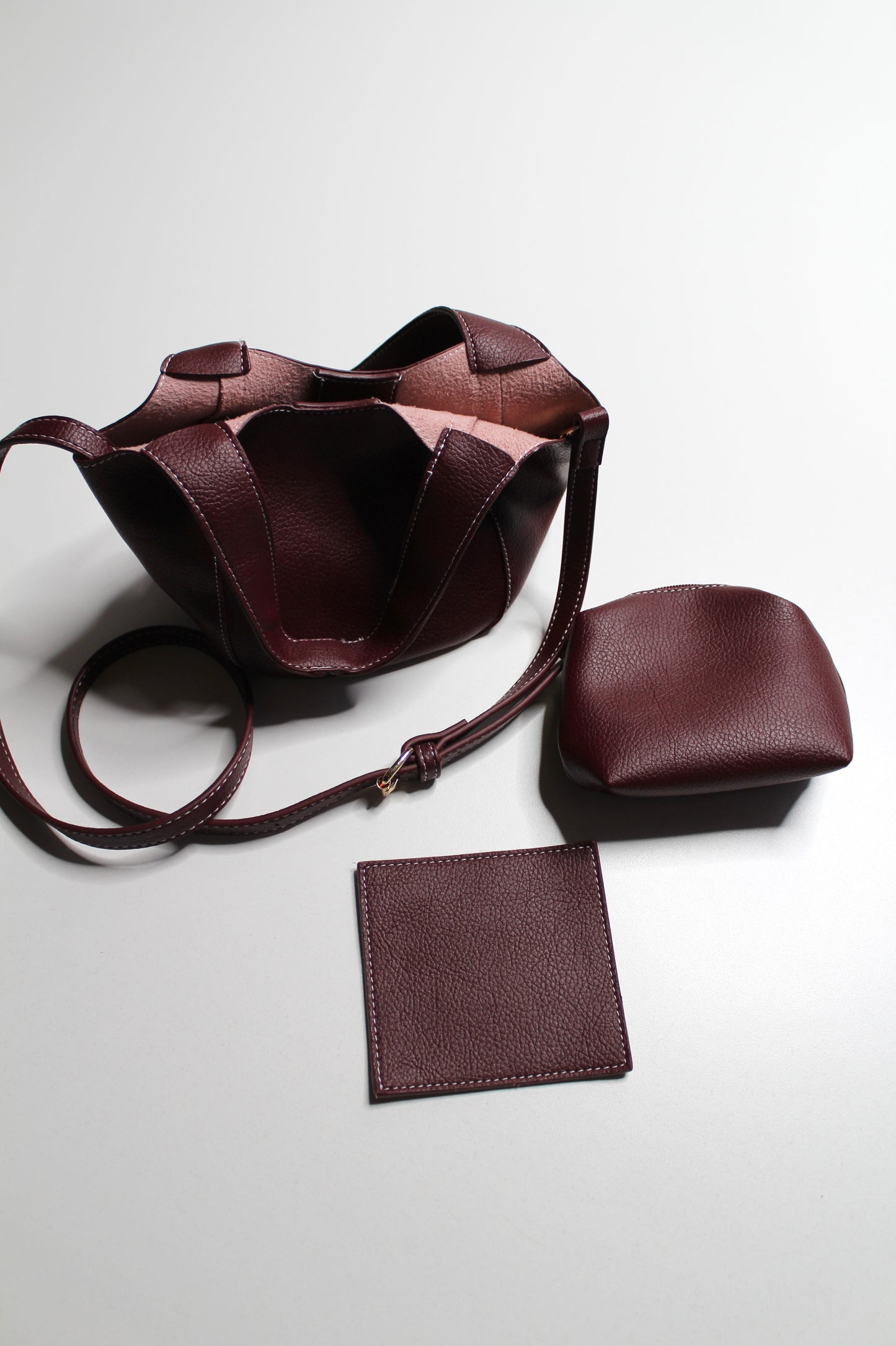 Anthropologie burgundy Sonia slouchy faux leather mini tote purse with matching zippered pouch