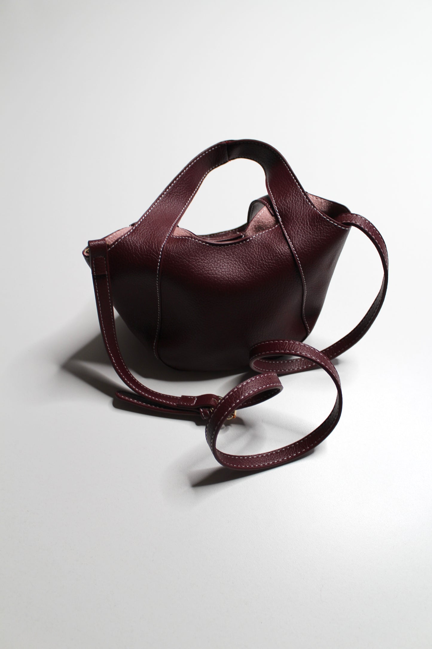 Anthropologie burgundy Sonia slouchy faux leather mini tote purse with matching zippered pouch