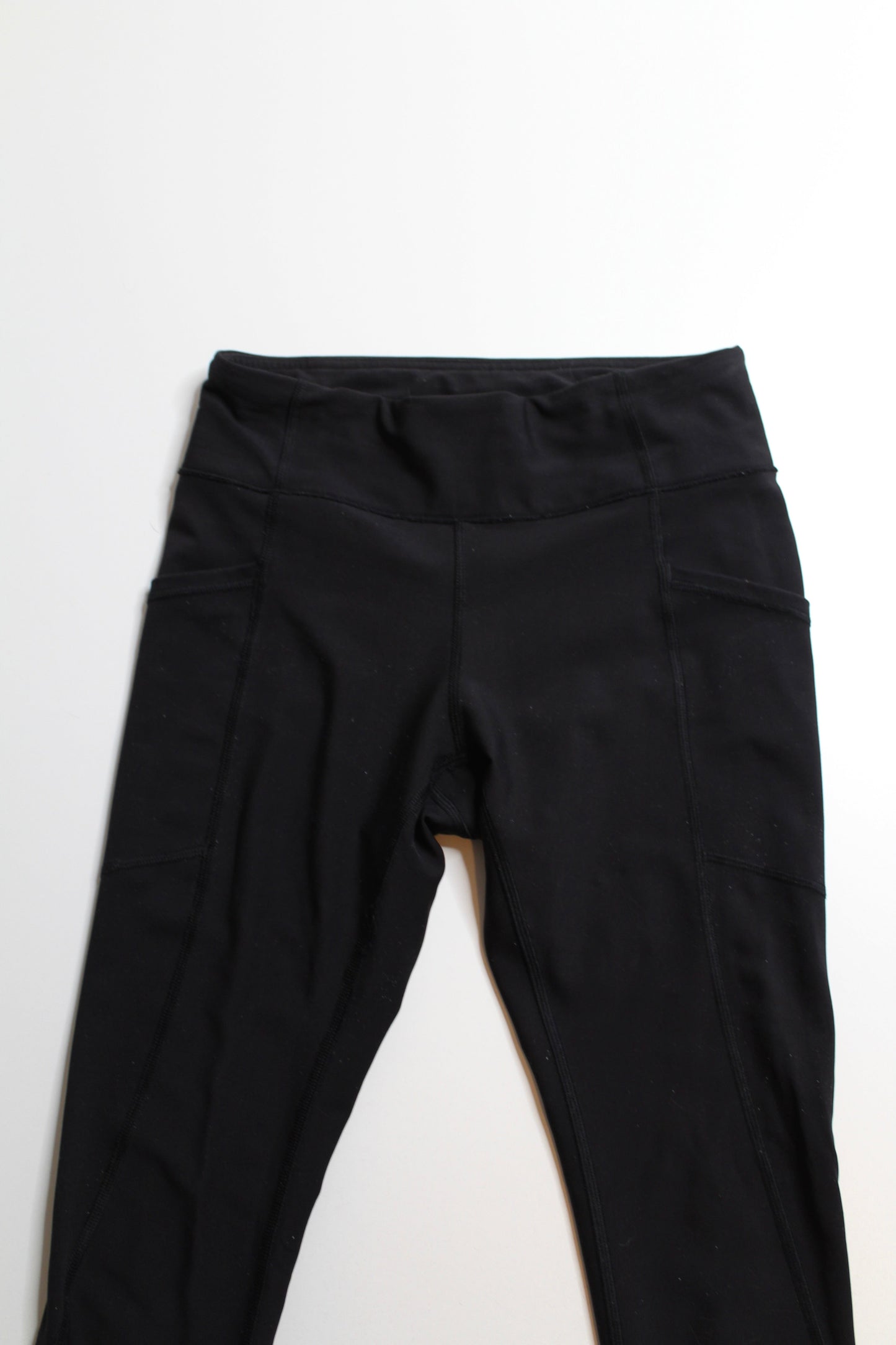 Lululemon black tight stuff tight, size 4 (25”) *flaw