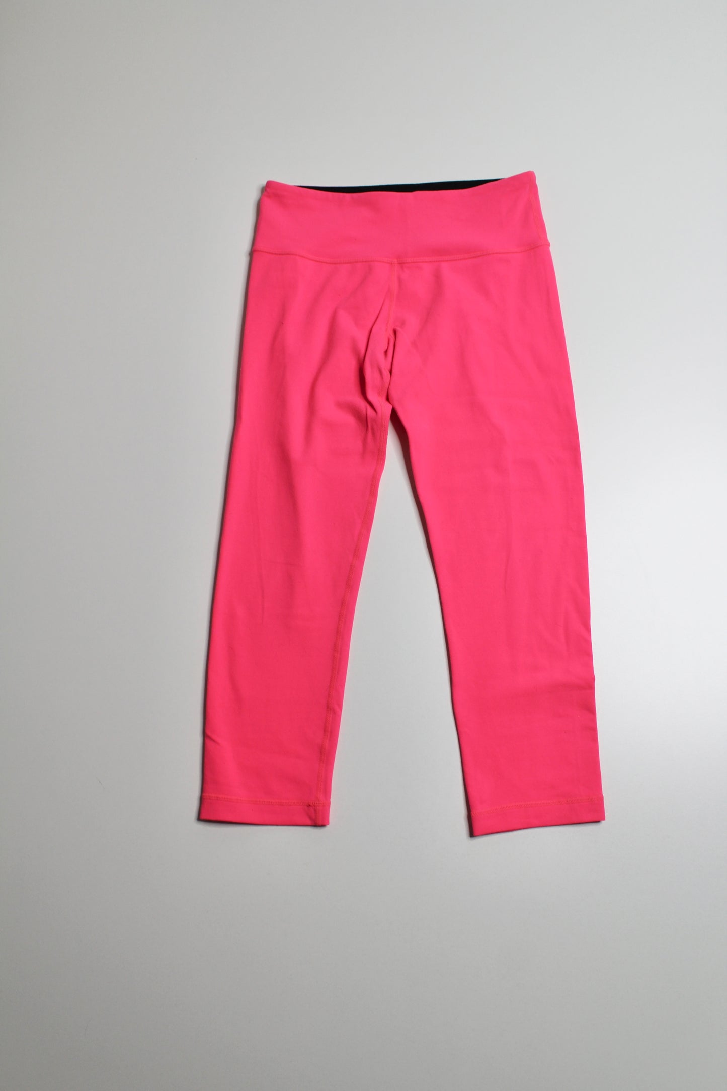 Lululemon fluorescent hot pink wunder under crop, size 4 (21") (price reduced: was $36)