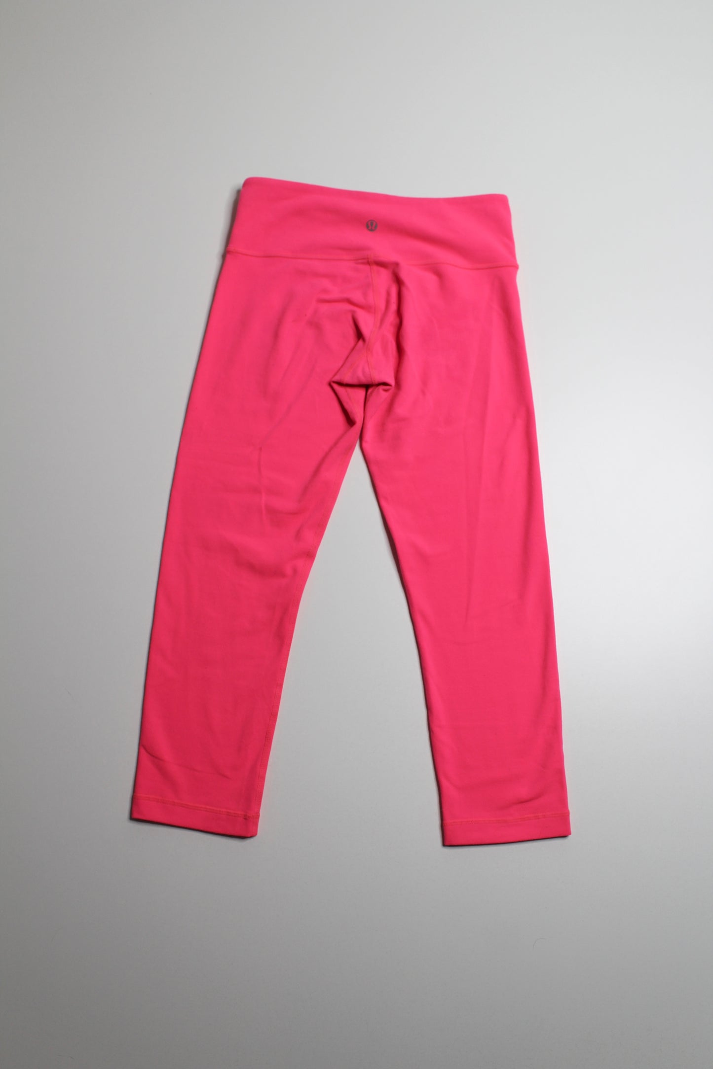 Lululemon fluorescent hot pink wunder under crop, size 4 (21") (price reduced: was $36)