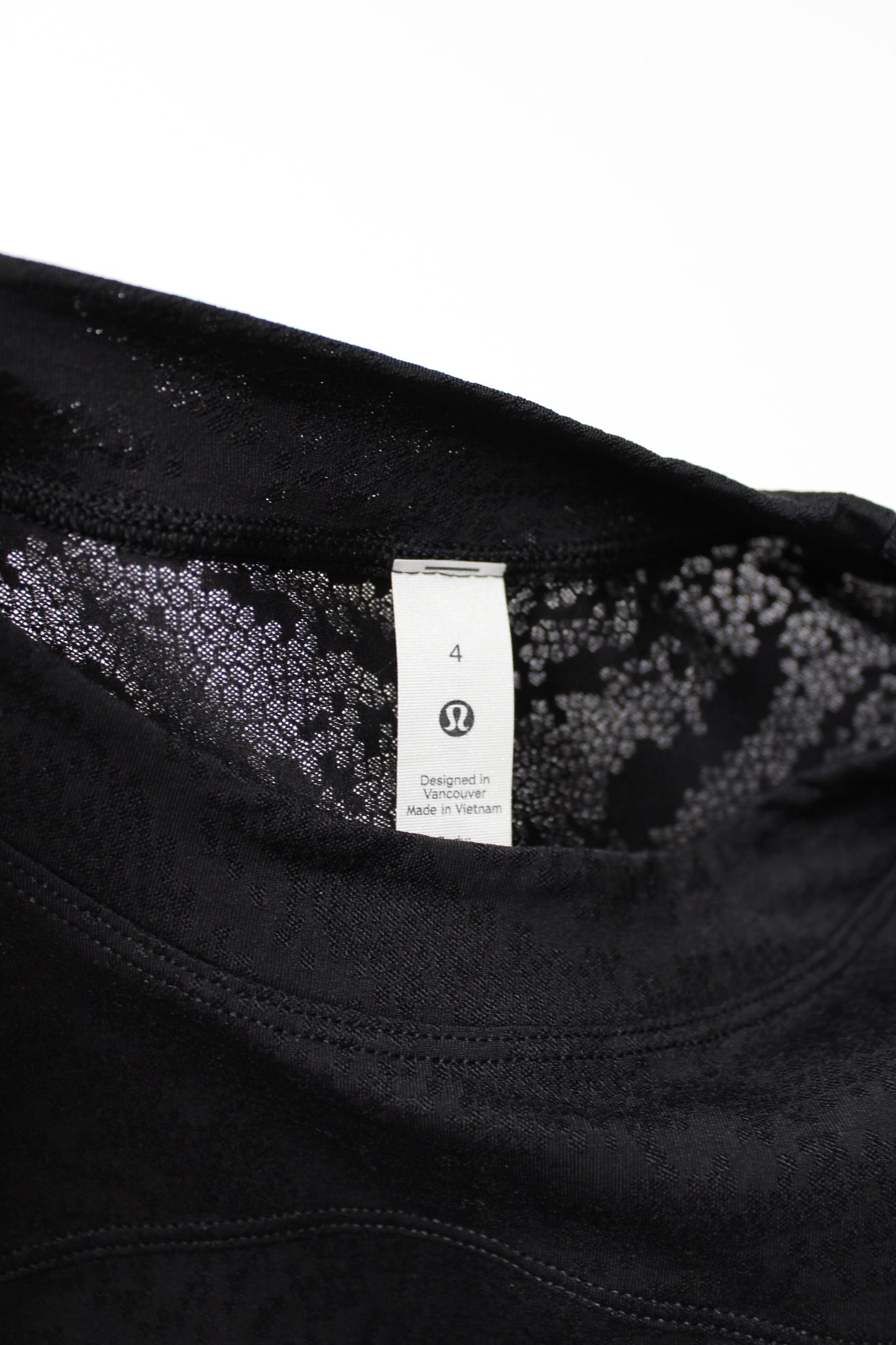 Lululemon black lace pattern t shirt, size 4 (loose oversized fit) (price reduced: was $30)