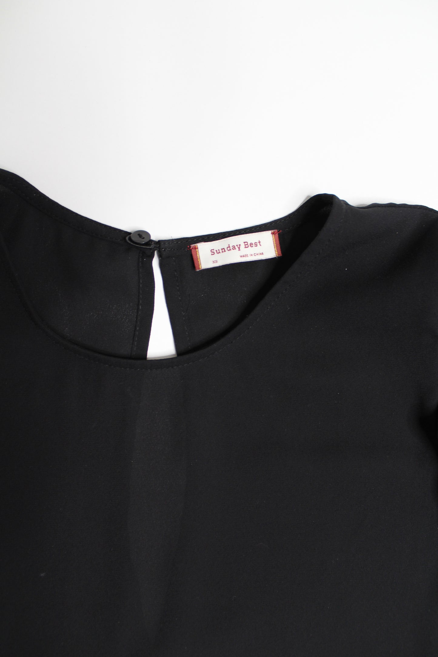 Aritzia Sunday Best black ruffle shoulder short sleeve blouse, size xs