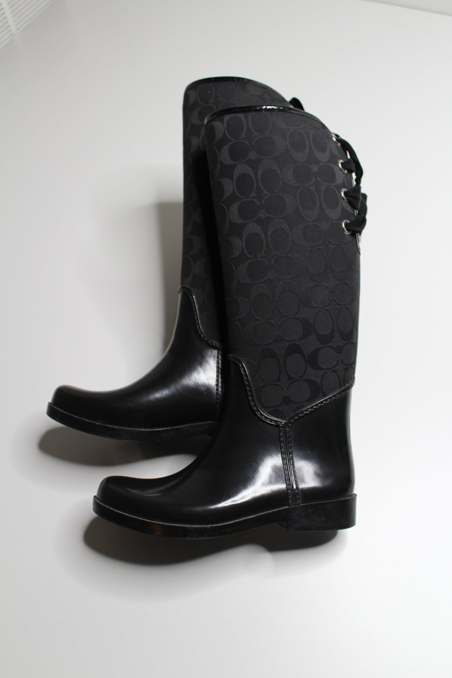 Coach black tristee lace up rain boots, size 7