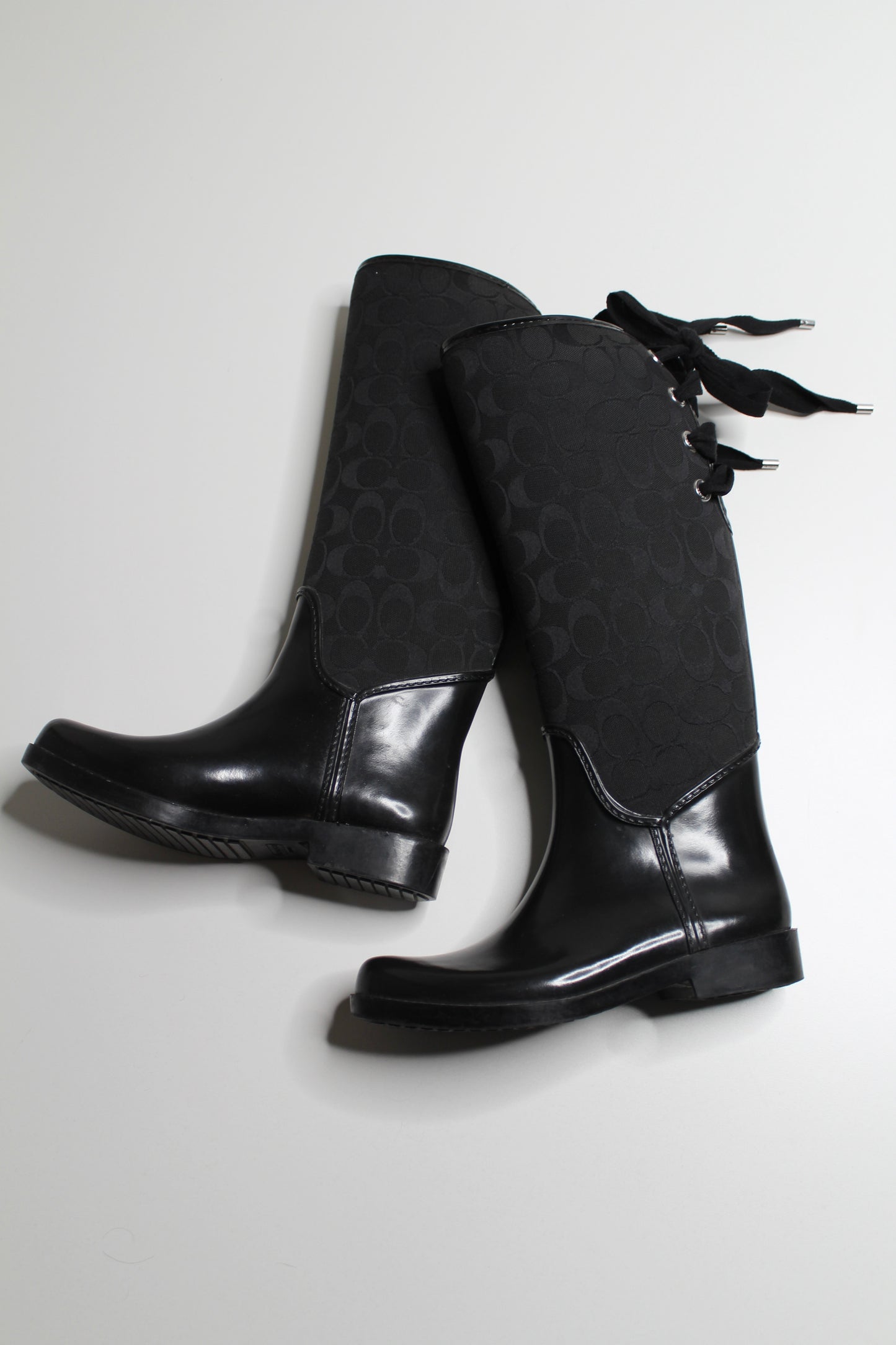 Coach black tristee lace up rain boots, size 7