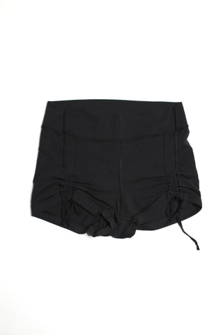 Lululemon black cinch ties  booty shorts, no size. Fits between 6/8 (2")