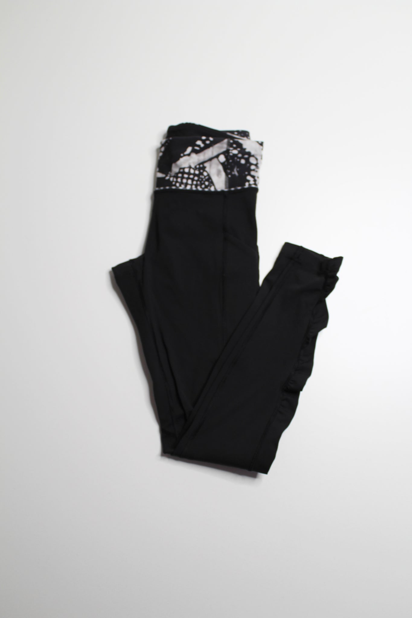 Lululemon black ruffle bottom reflective run tights, size 4 (price reduced: was $40)