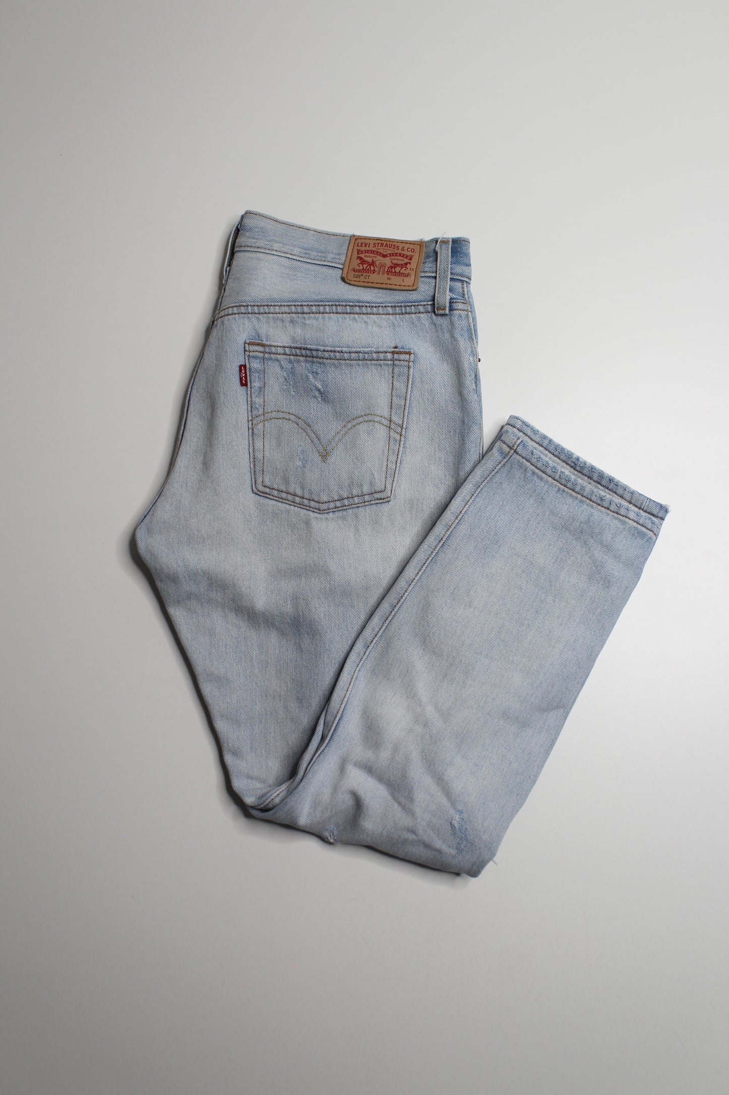 Levi’s 501 distressed jeans, size 28 (25”)