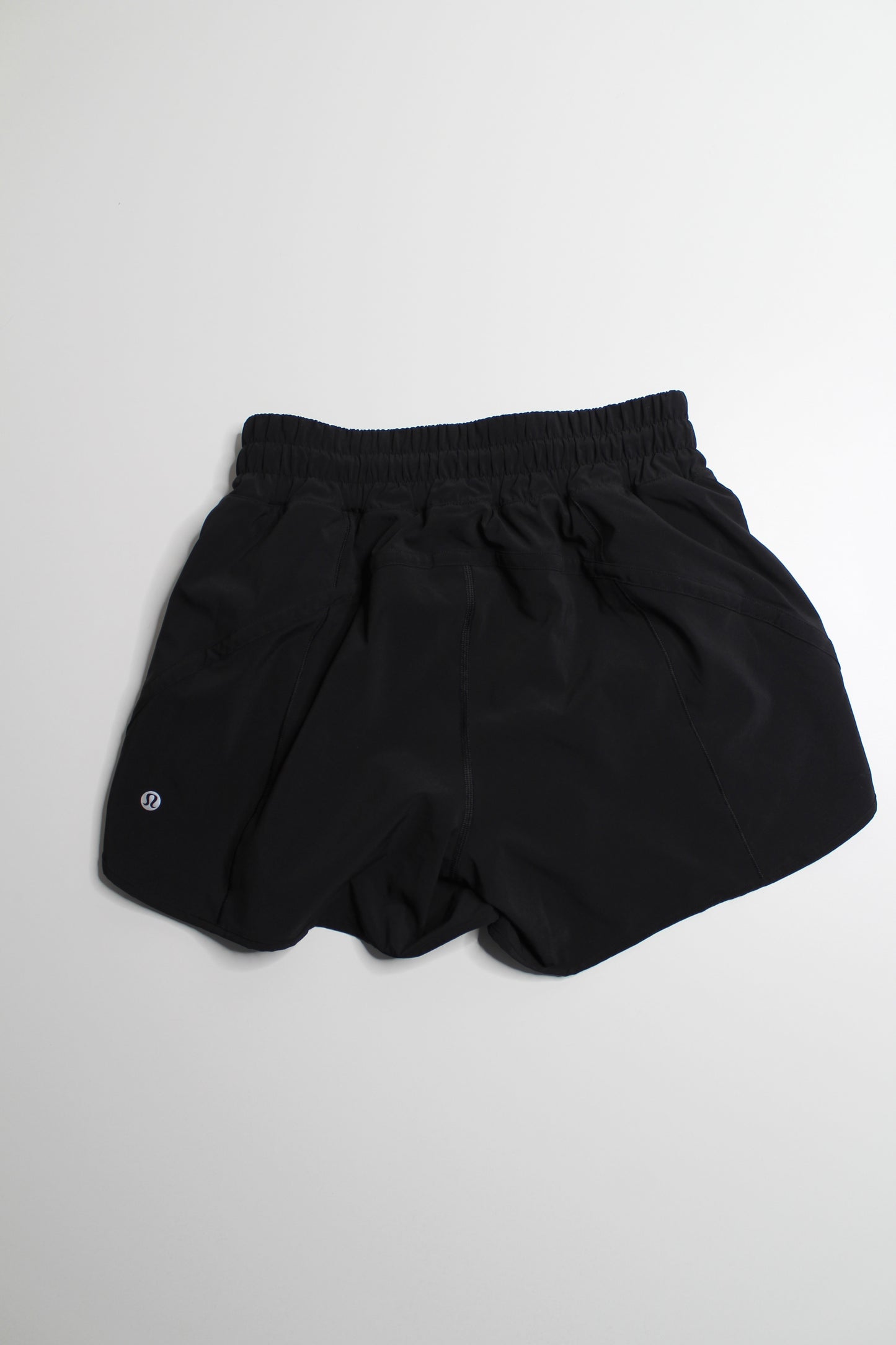 Lululemon black track that shorts, size 6 (5")