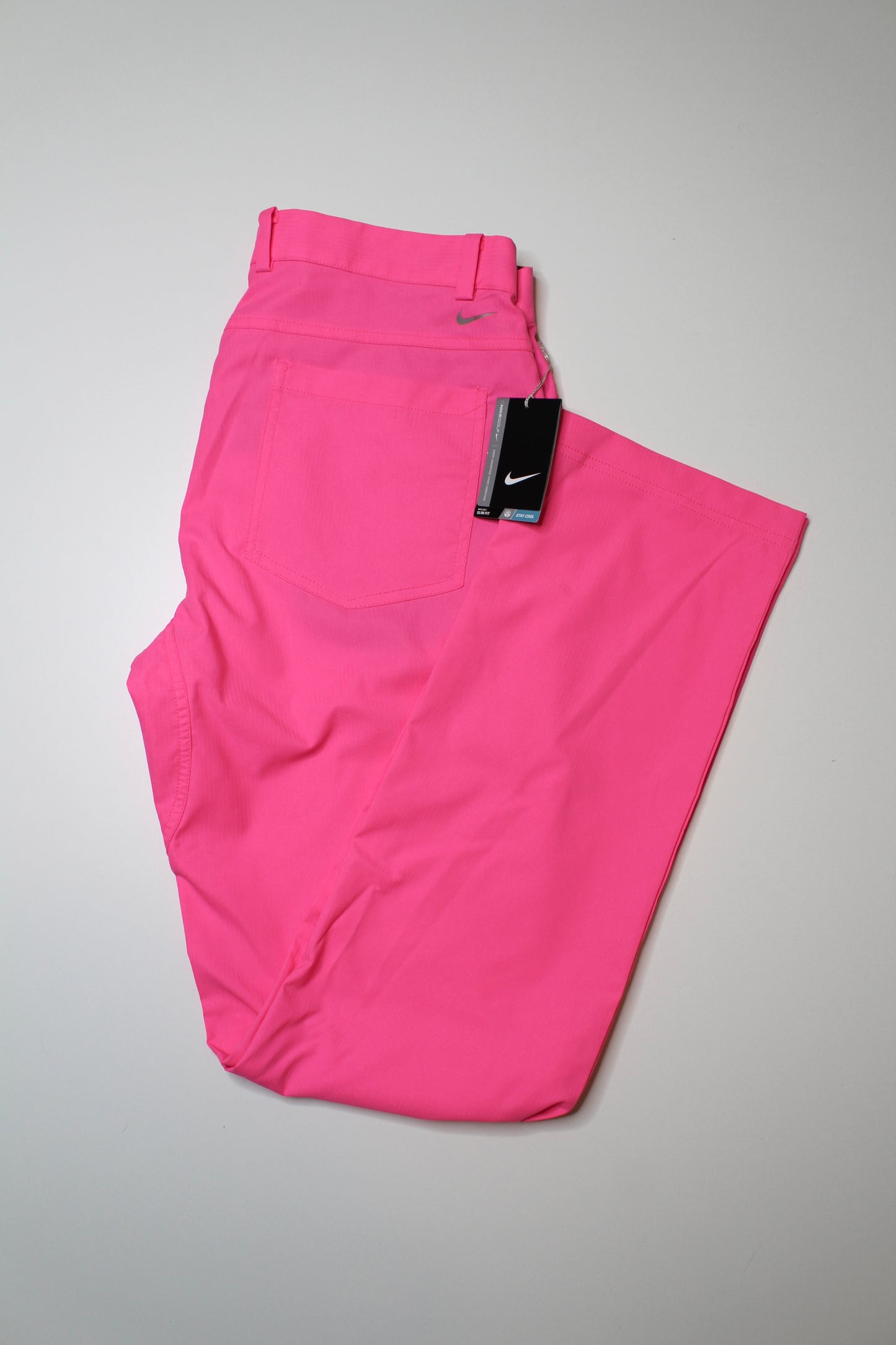 Mens Nike neon pink golf pant, size 34 *new with tags (additional 20% off)