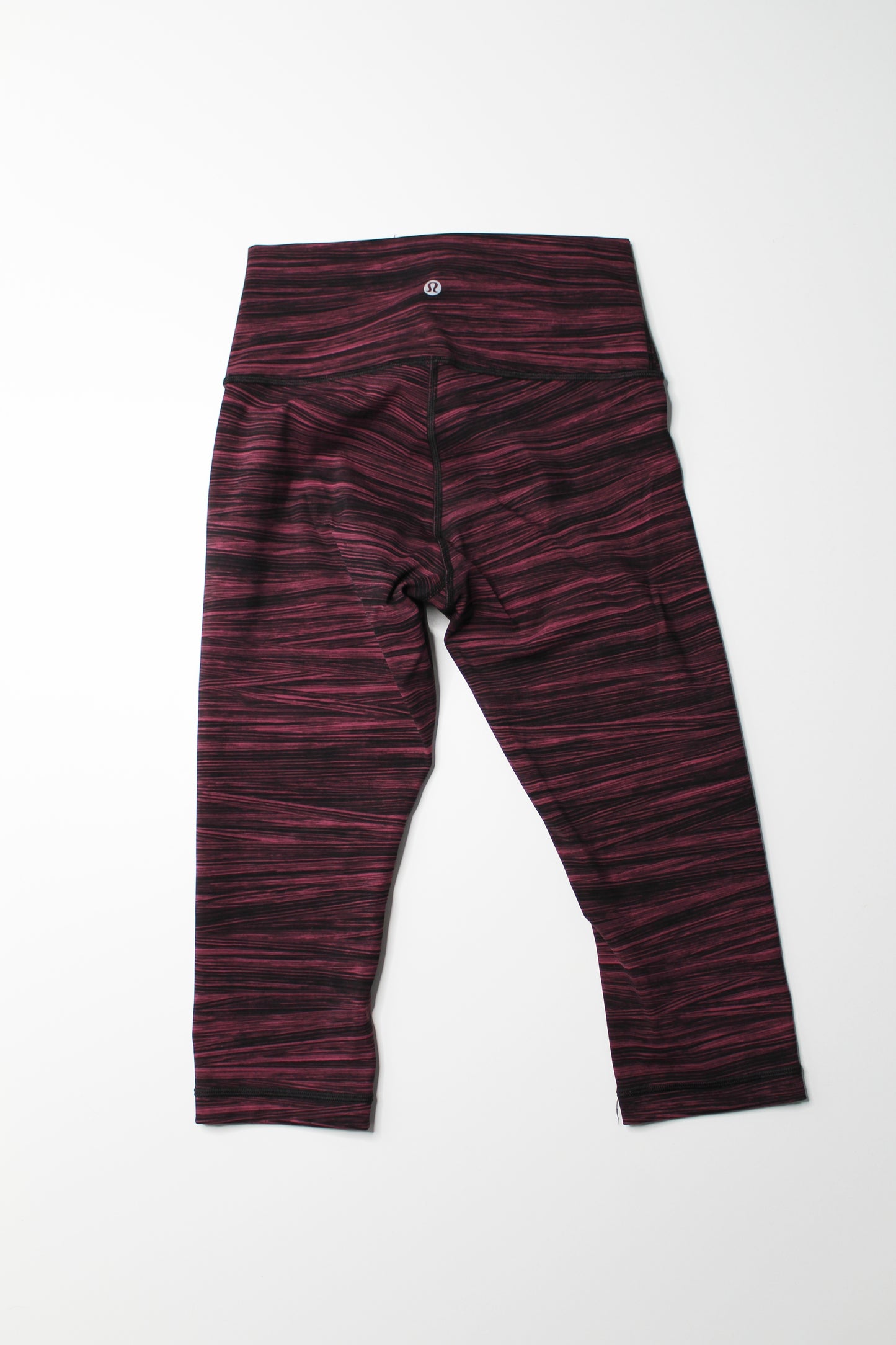 Lululemon pink / black stripe wunder under crop, size 6 (17") (price reduced: was $40)