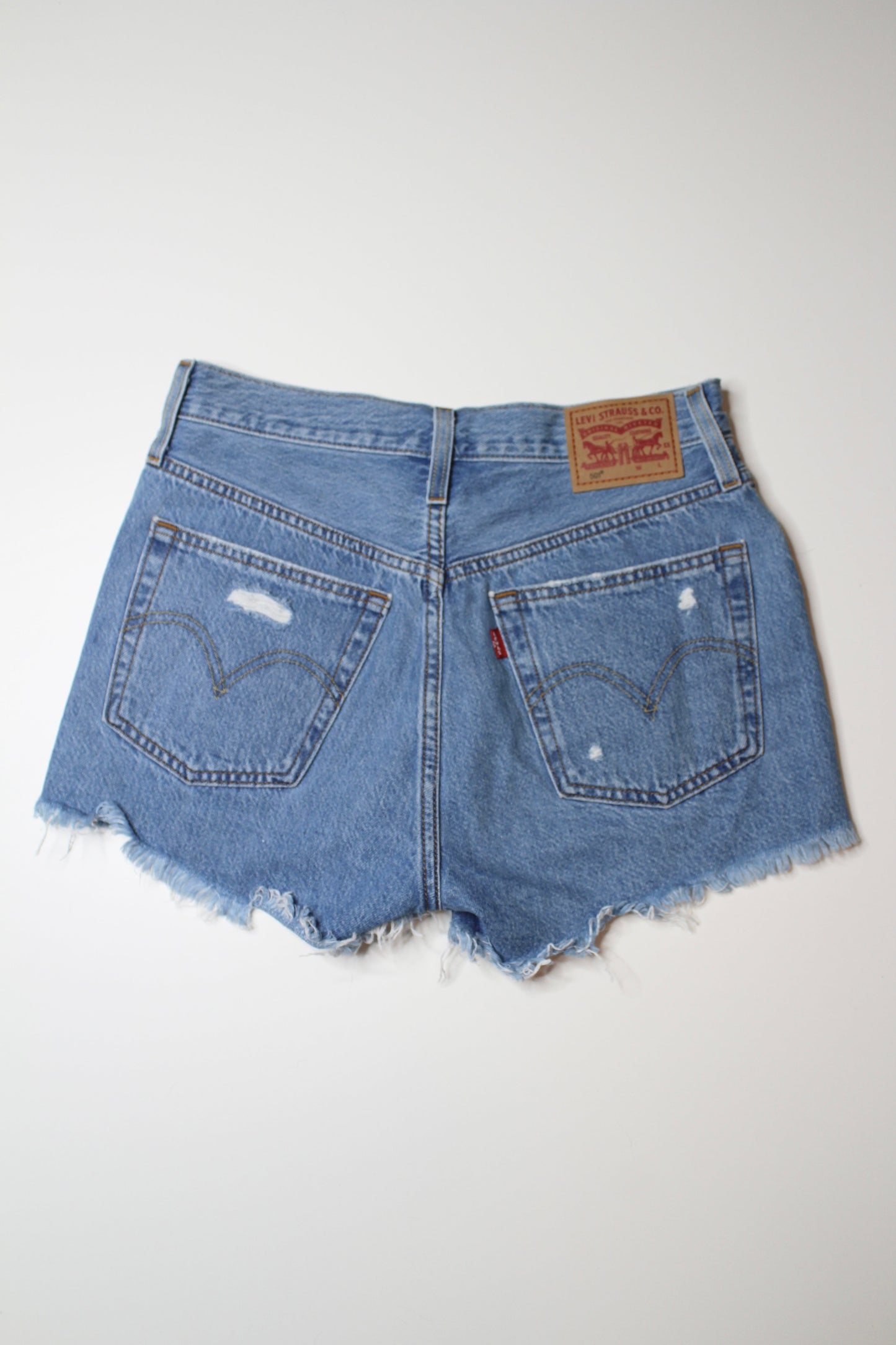 Levi’s distressed high rise cut off jean shorts, size 25