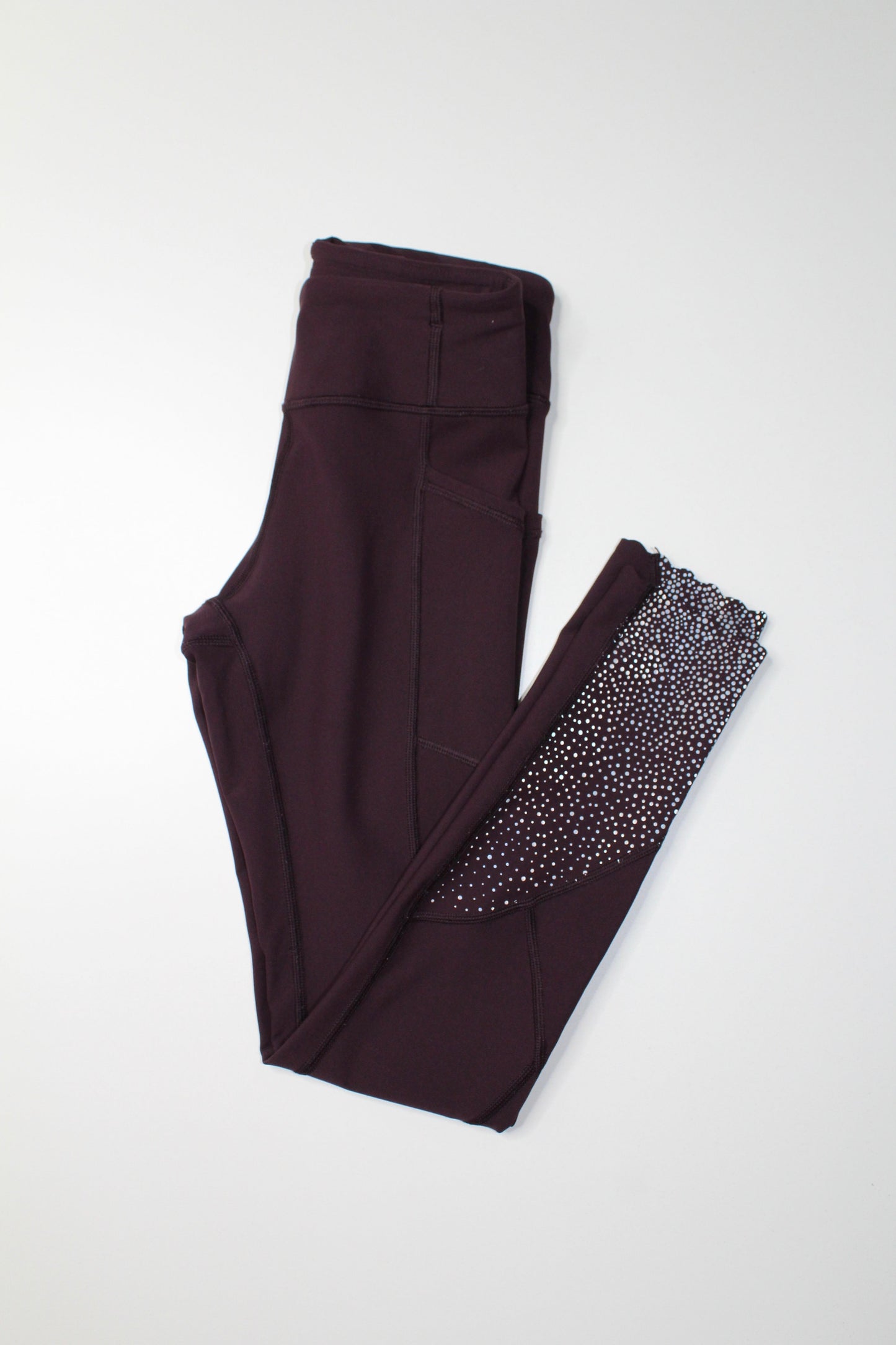 Lululemon black cherry tight stuff tight, size 2 *reflective (25")