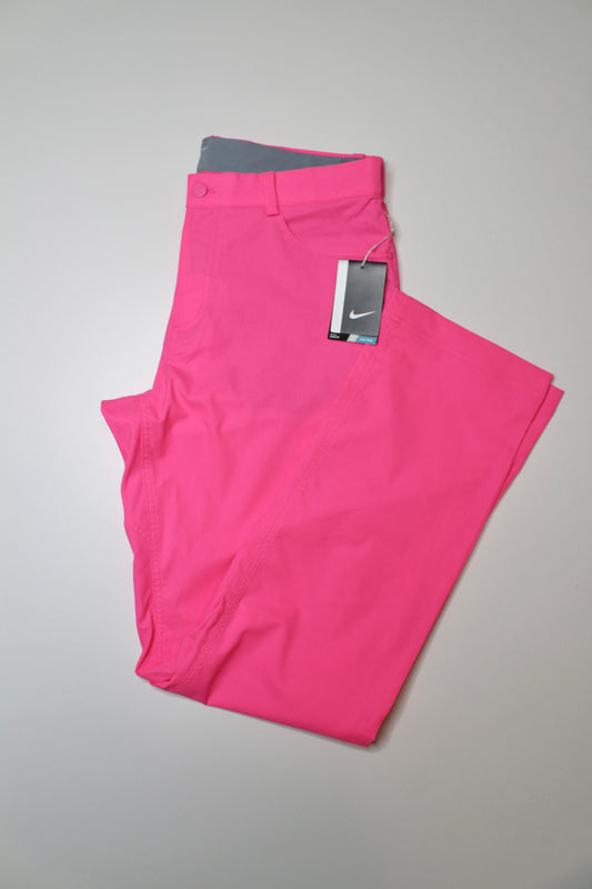 Mens Nike neon pink golf pant, size 34 *new with tags (additional 20% off)