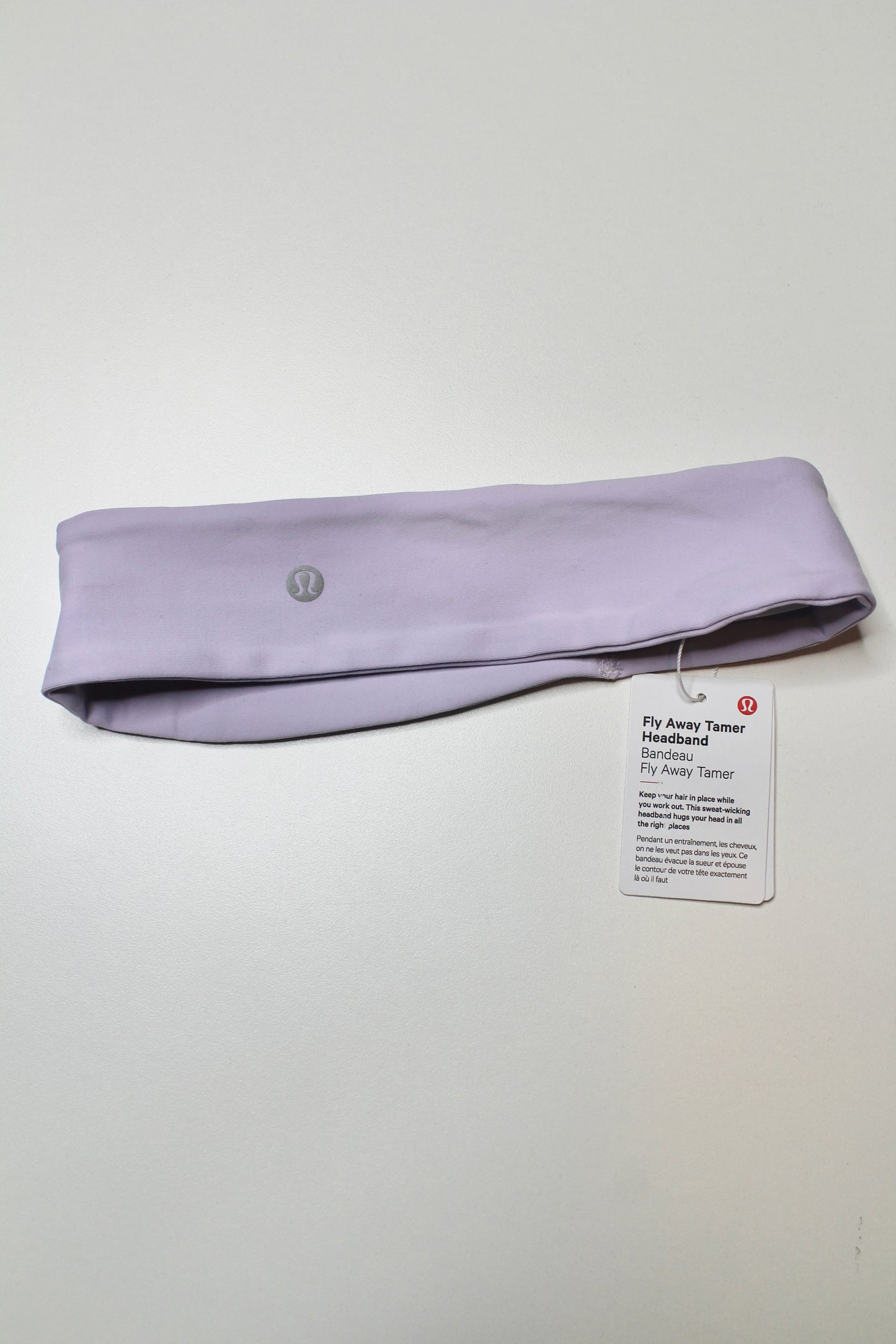 Lululemon light purple 'fly away tamer' headband *new with tags