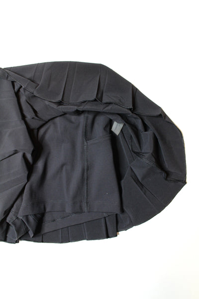 Aritzia TNA black tennis skirt, size medium (price reduced: was $25)