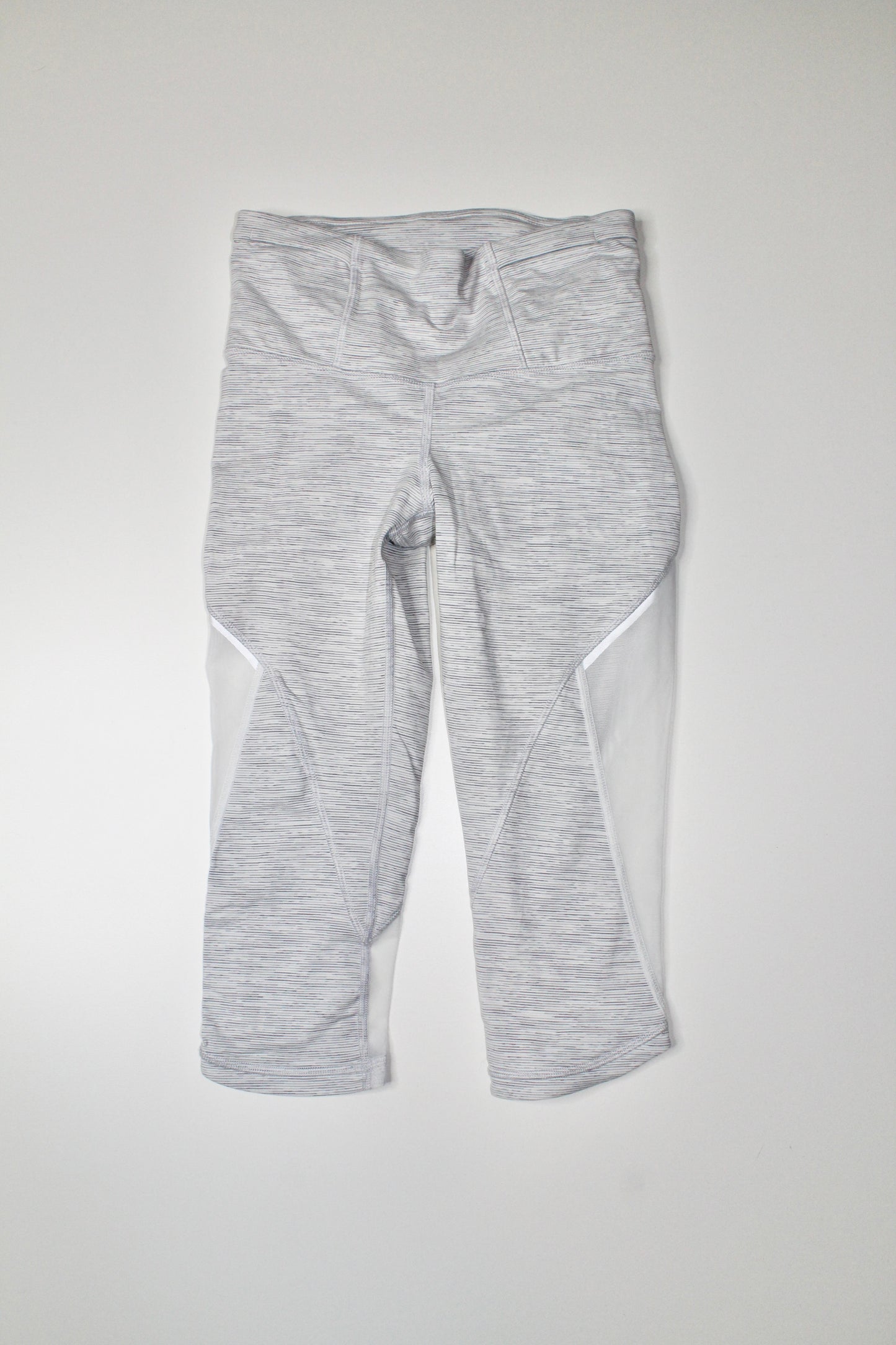 Lululemon we are from space battleship/white run with the sun crop, size 4 (15”) (price reduced: was $36)