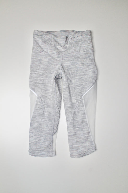 Lululemon we are from space battleship/white run with the sun crop, size 4 (15”) (price reduced: was $36)