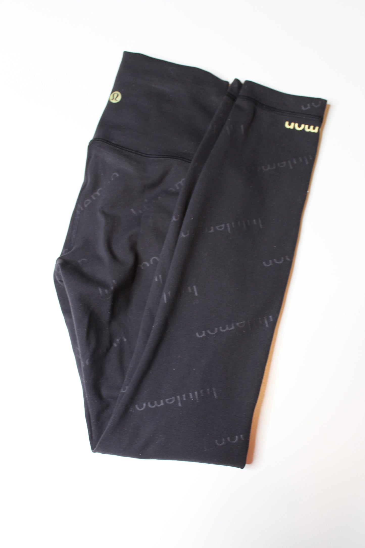 Lululemon black embossed wunder train high rise tight, size 2 (25") *special edition