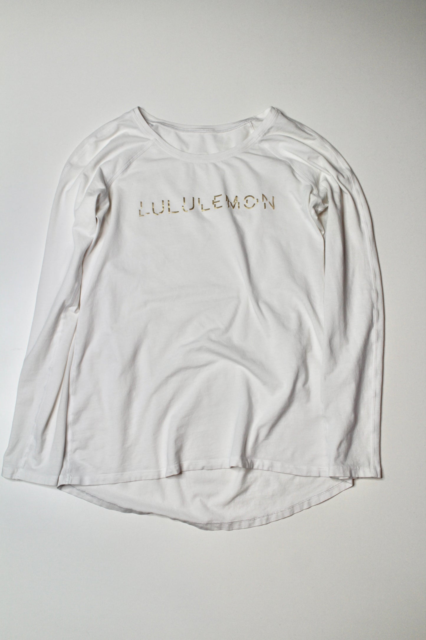 Lululemon white emerald long sleeve, size 4 (loose fit) *special edition