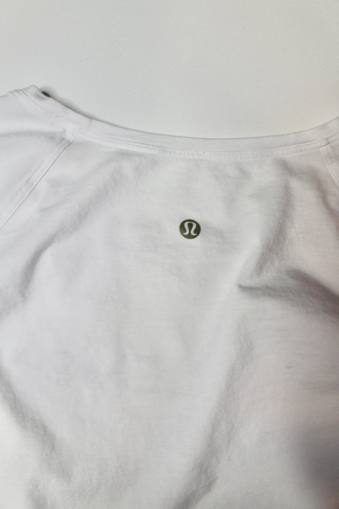 Lululemon white emerald long sleeve, size 4 (loose fit) *special edition