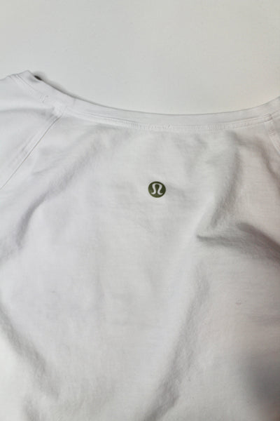 Lululemon white emerald long sleeve, size 4 (loose fit) *special edition (price reduced: was $30)