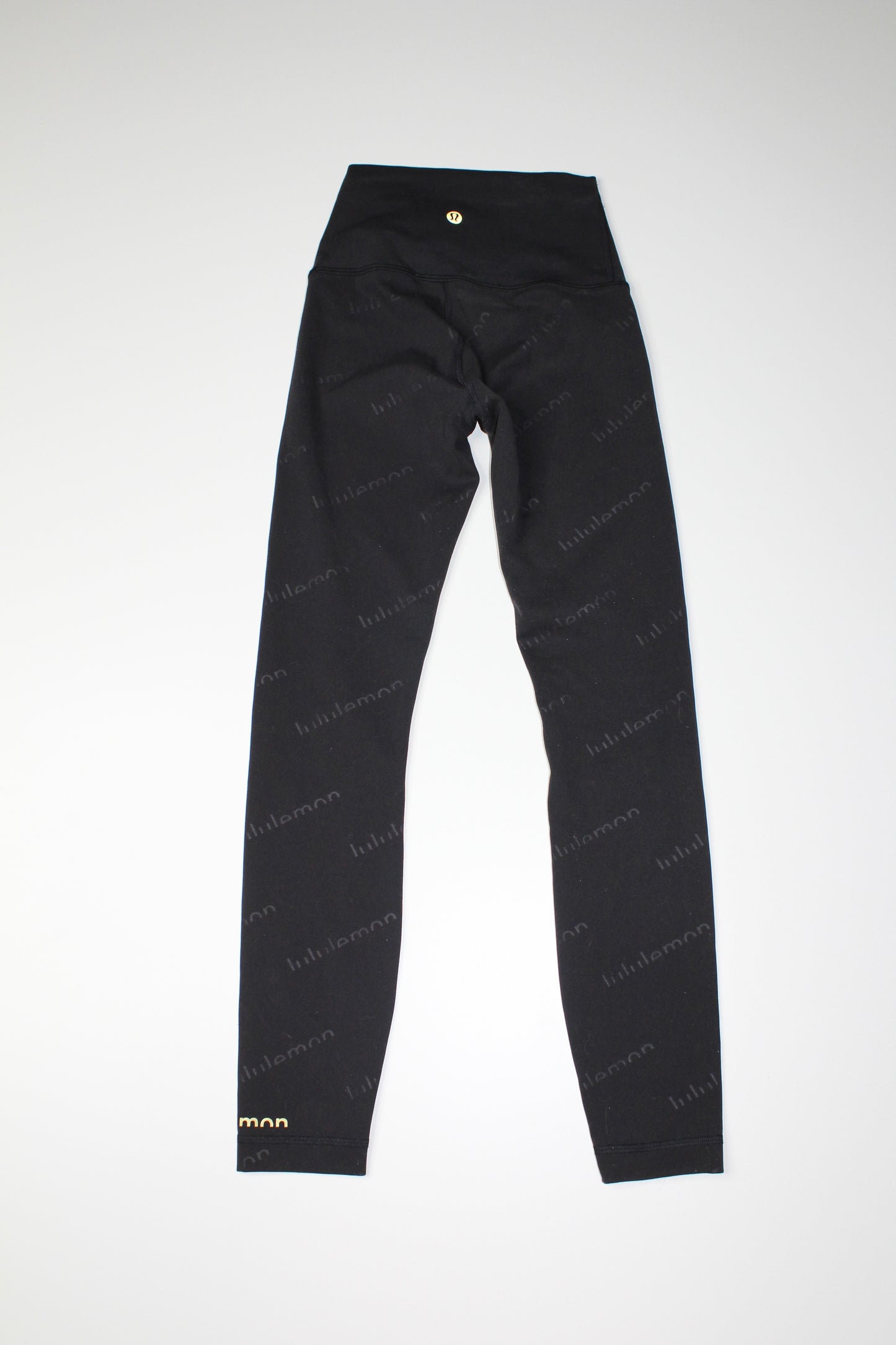 Lululemon black embossed wunder train high rise tight, size 2 (25") *special edition